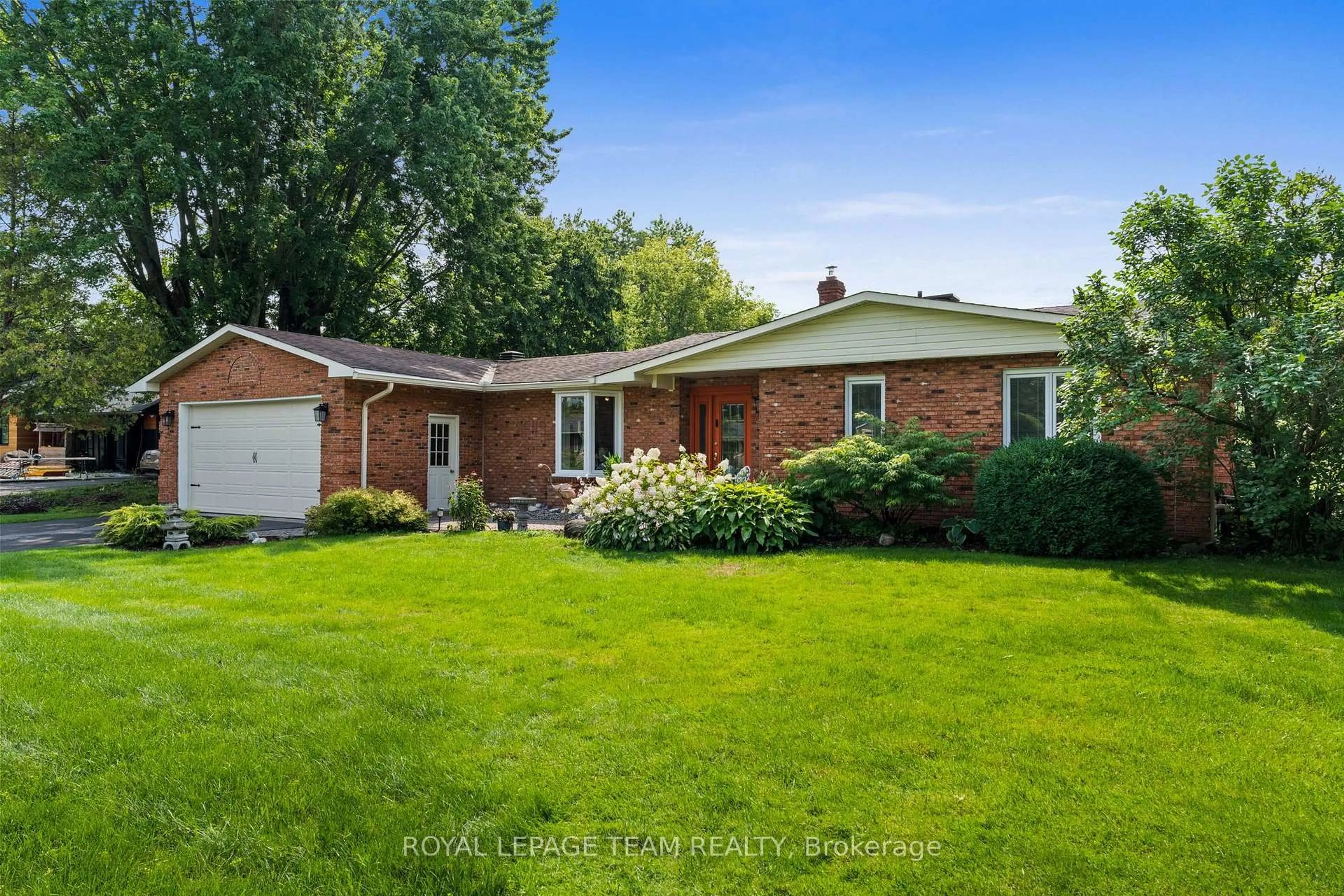Home with brick exterior material, street for 1282 Fairway Dr, Manotick Ontario K4M 1B3
