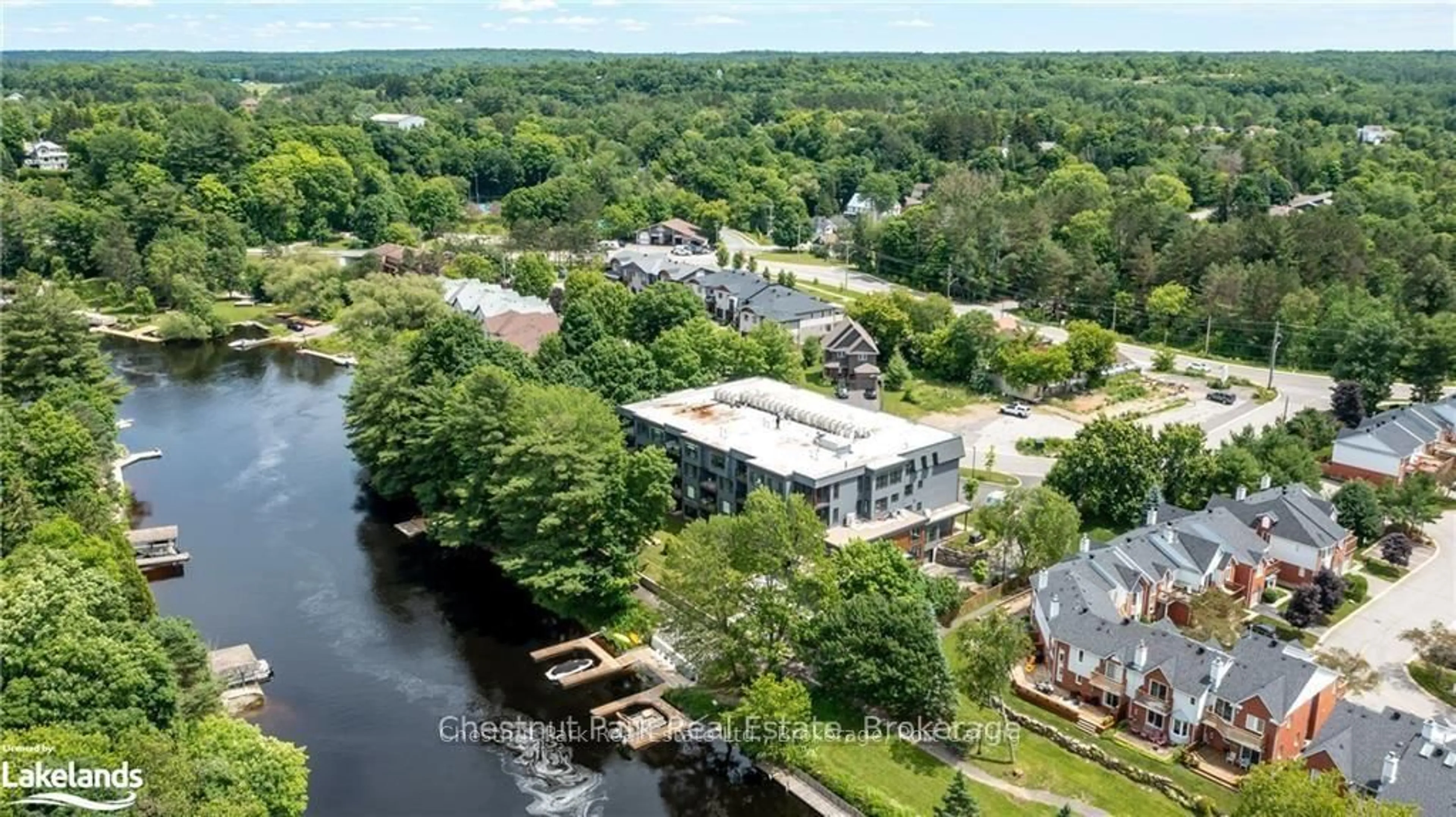 A pic from outside/outdoor area/front of a property/back of a property/a pic from drone, water/lake/river/ocean view for 200 ANGLO St #304, Bracebridge Ontario P1L 1G4