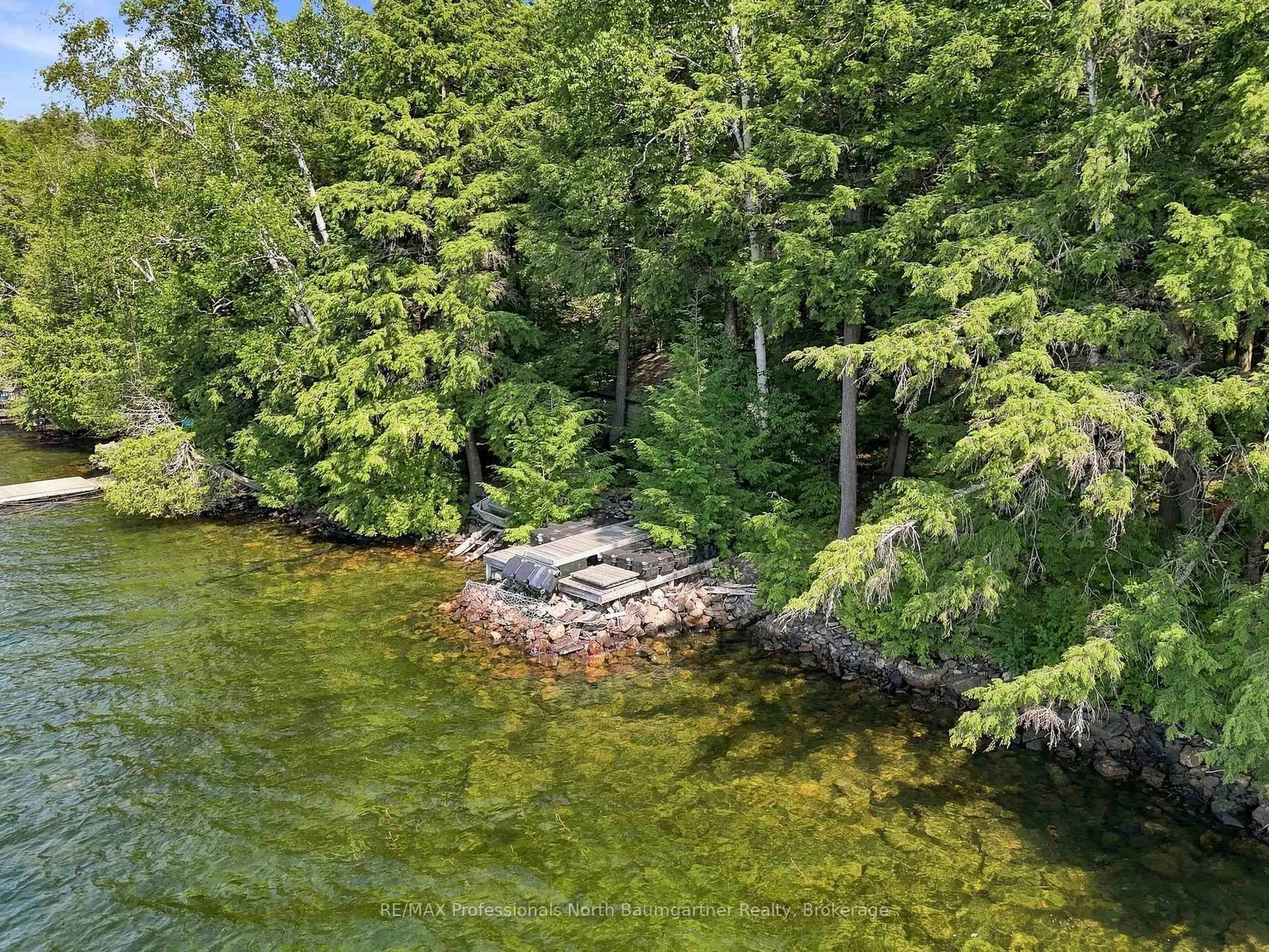 A pic from outside/outdoor area/front of a property/back of a property/a pic from drone, water/lake/river/ocean view for 2183 Trapper's Tr, Dysart et al Ontario K0M 1S0