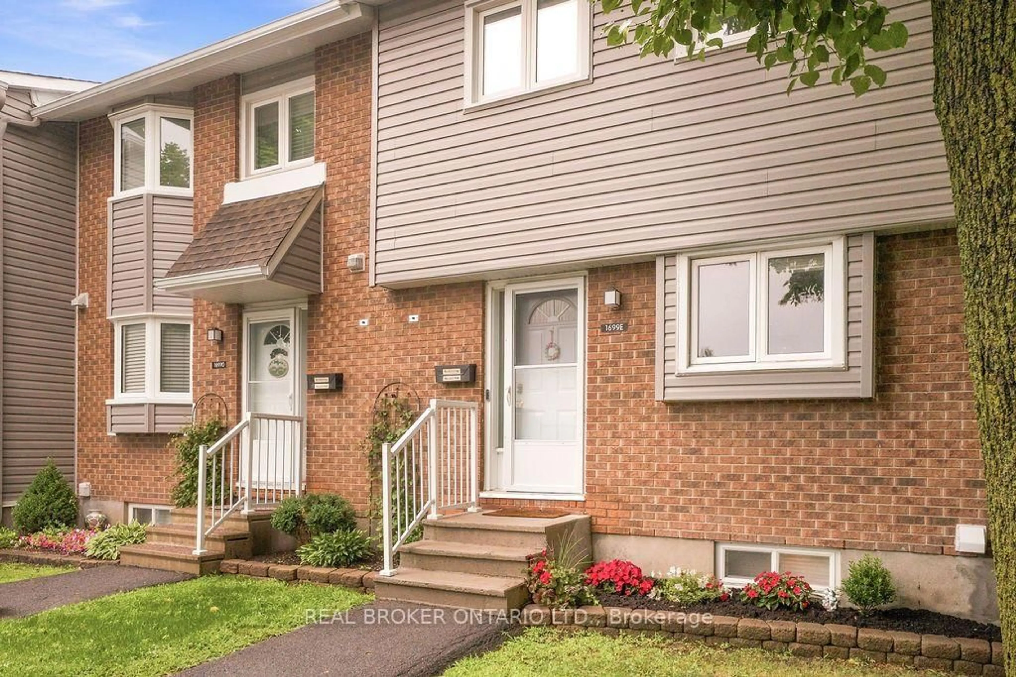 Home with brick exterior material, street for 1699E Lamoureux Dr, Ottawa Ontario K1E 2N3