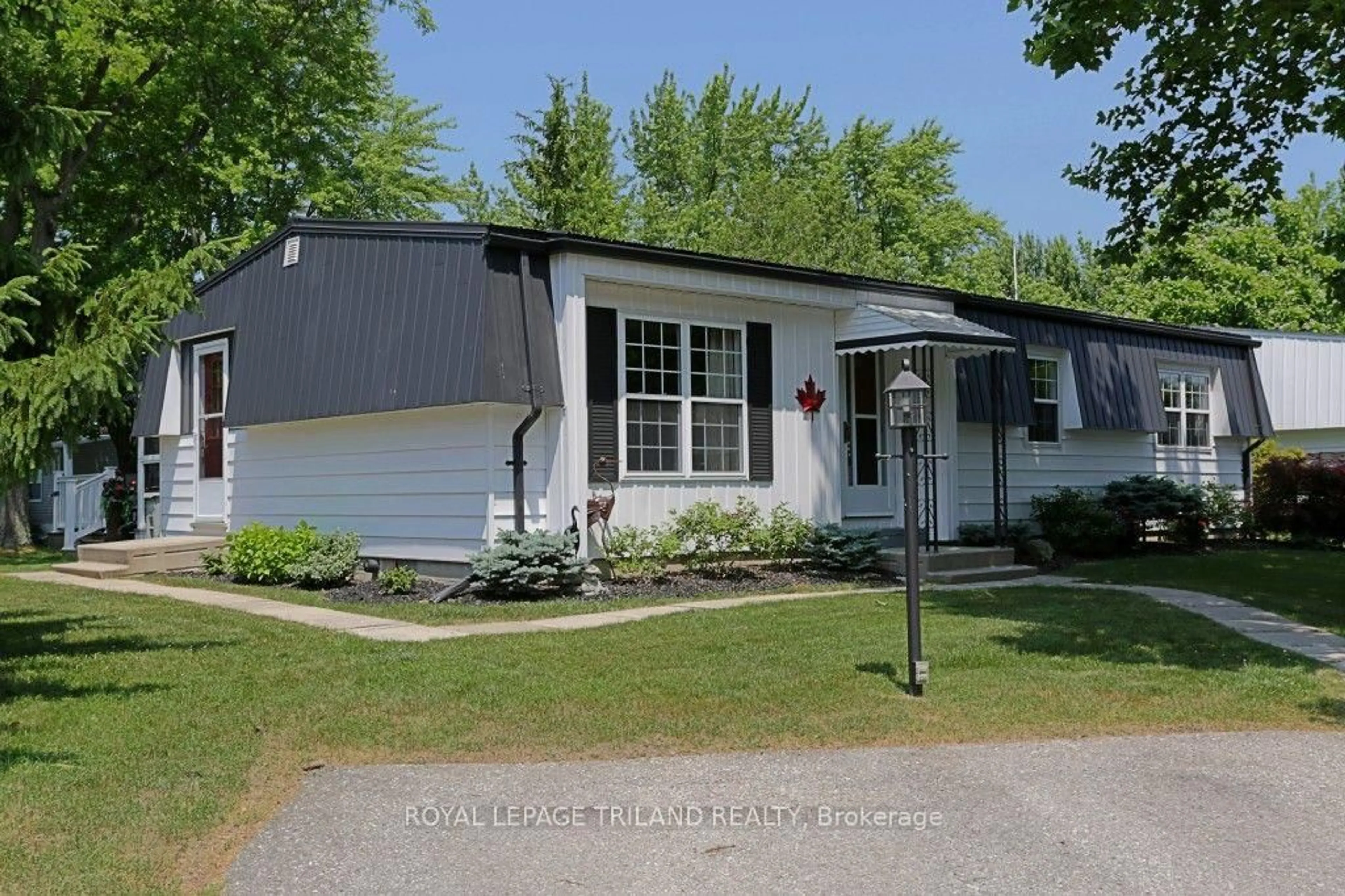 Home with vinyl exterior material, street for 314 Wyldwood Lane, South Huron Ontario N0M 1T0