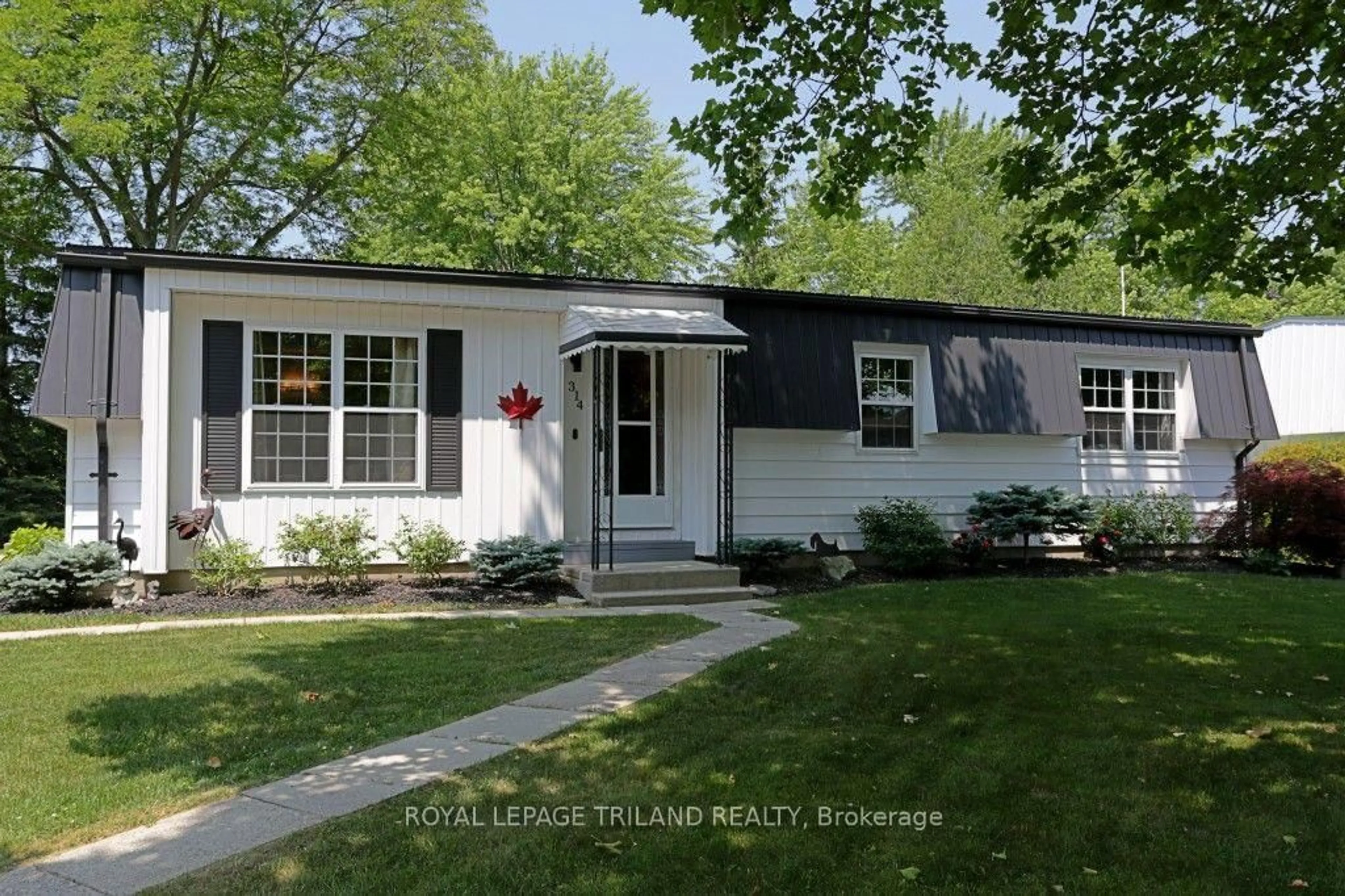 Home with vinyl exterior material, street for 314 Wyldwood Lane, South Huron Ontario N0M 1T0