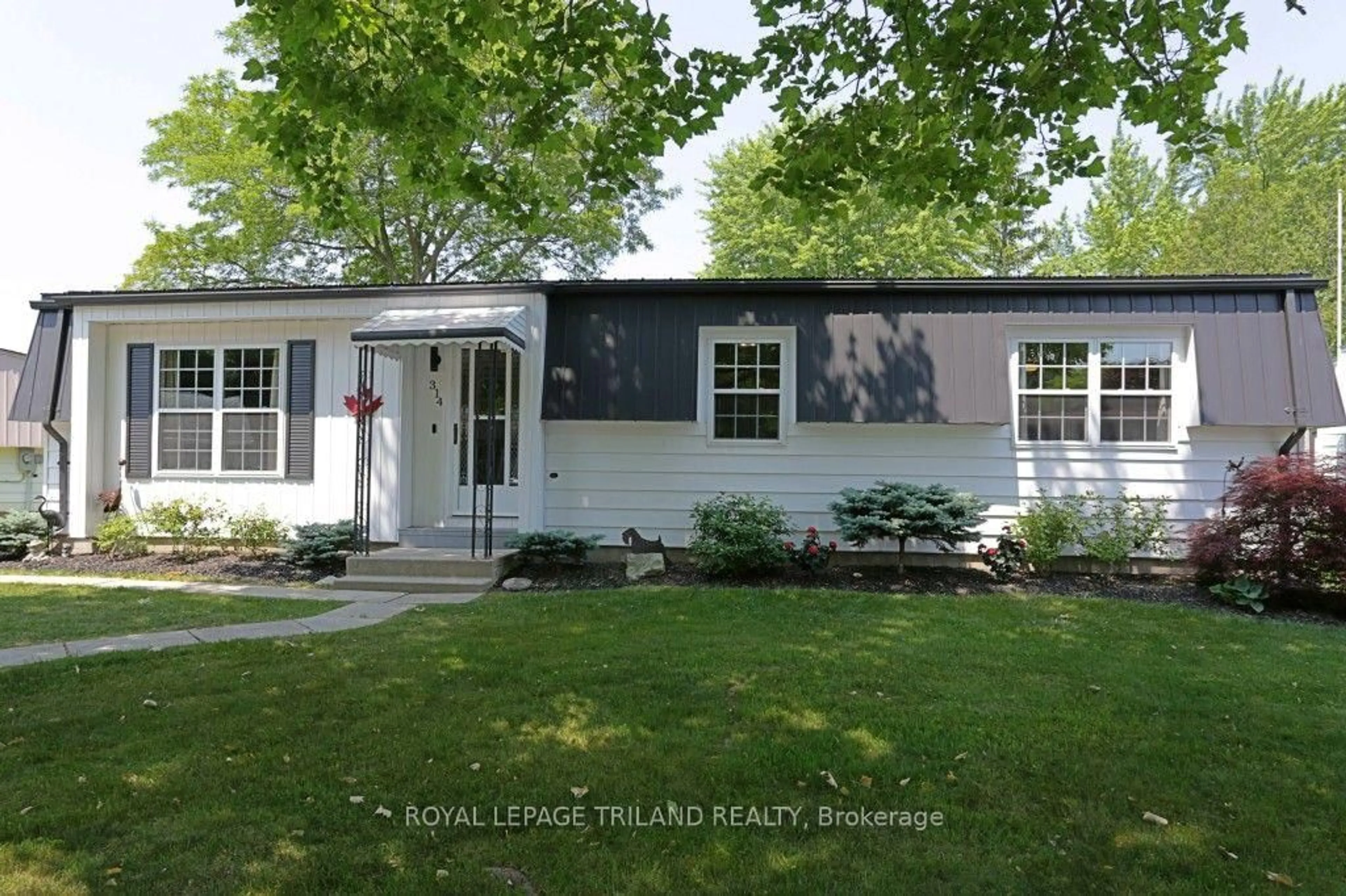 Home with vinyl exterior material, street for 314 Wyldwood Lane, South Huron Ontario N0M 1T0