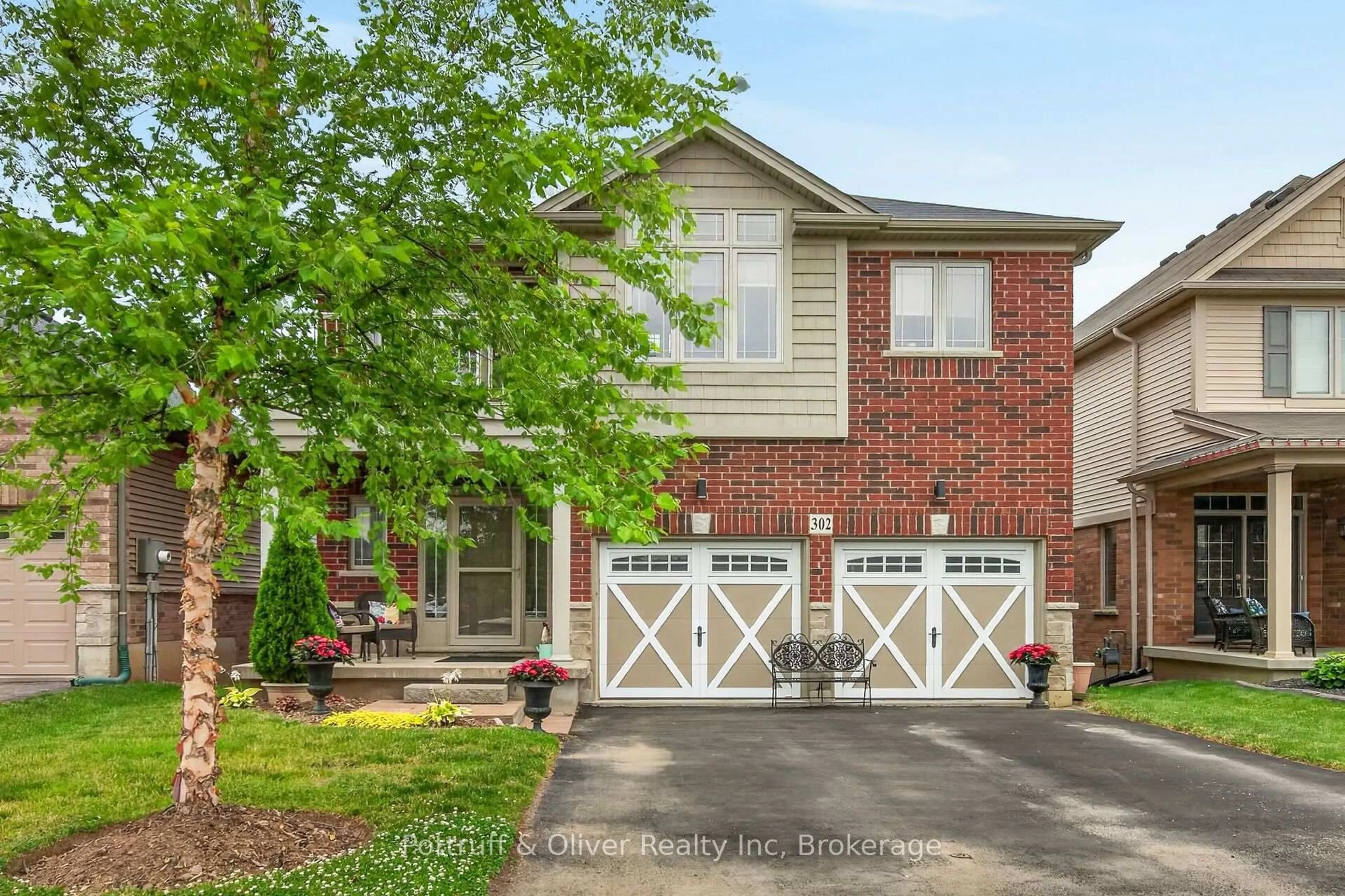 Home with brick exterior material, street for 302 Festival Way, Hamilton Ontario L0R 1C0