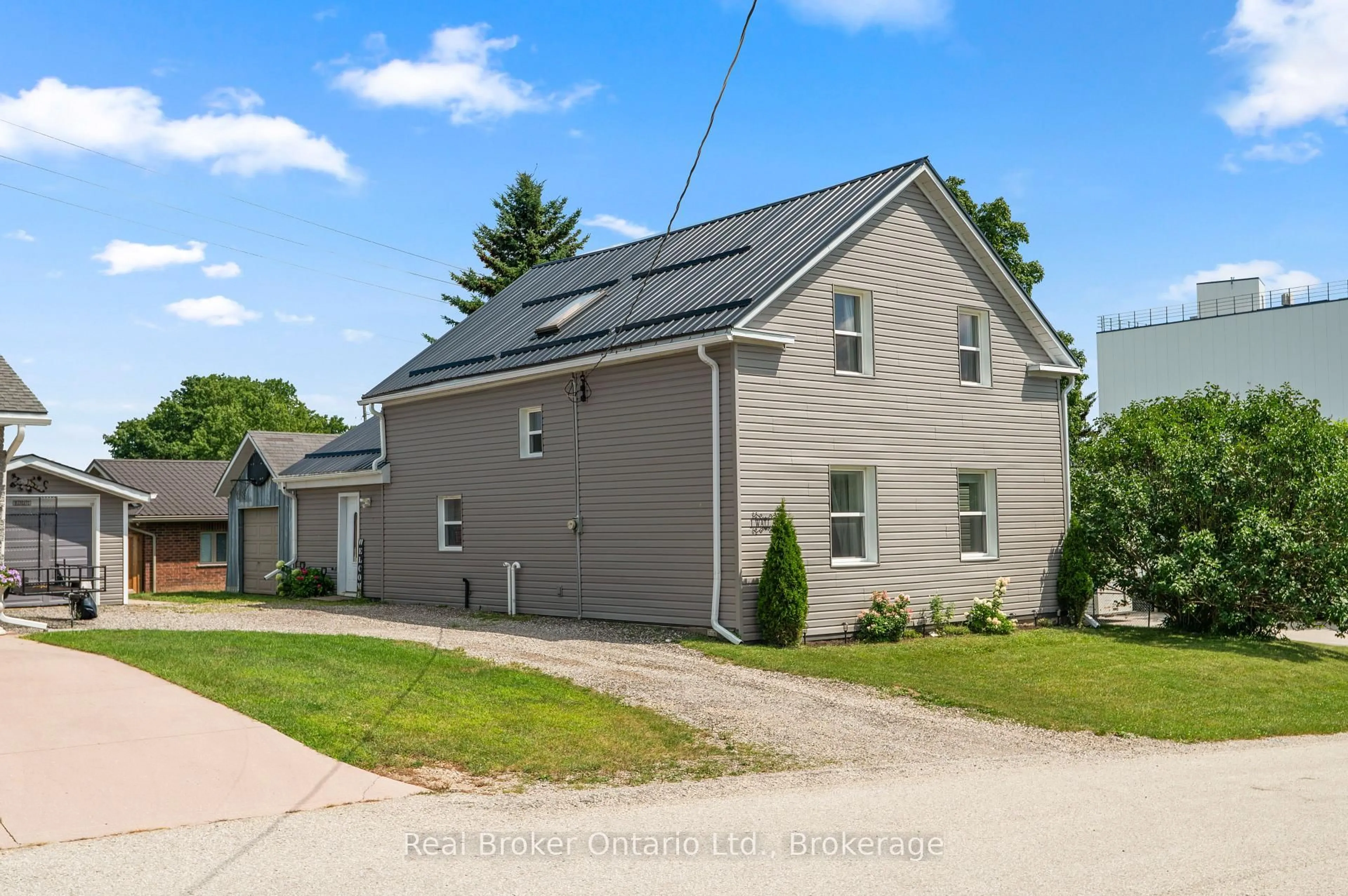 A pic from outside/outdoor area/front of a property/back of a property/a pic from drone, street for 1 Wall St, South Bruce Ontario N0G 2S0