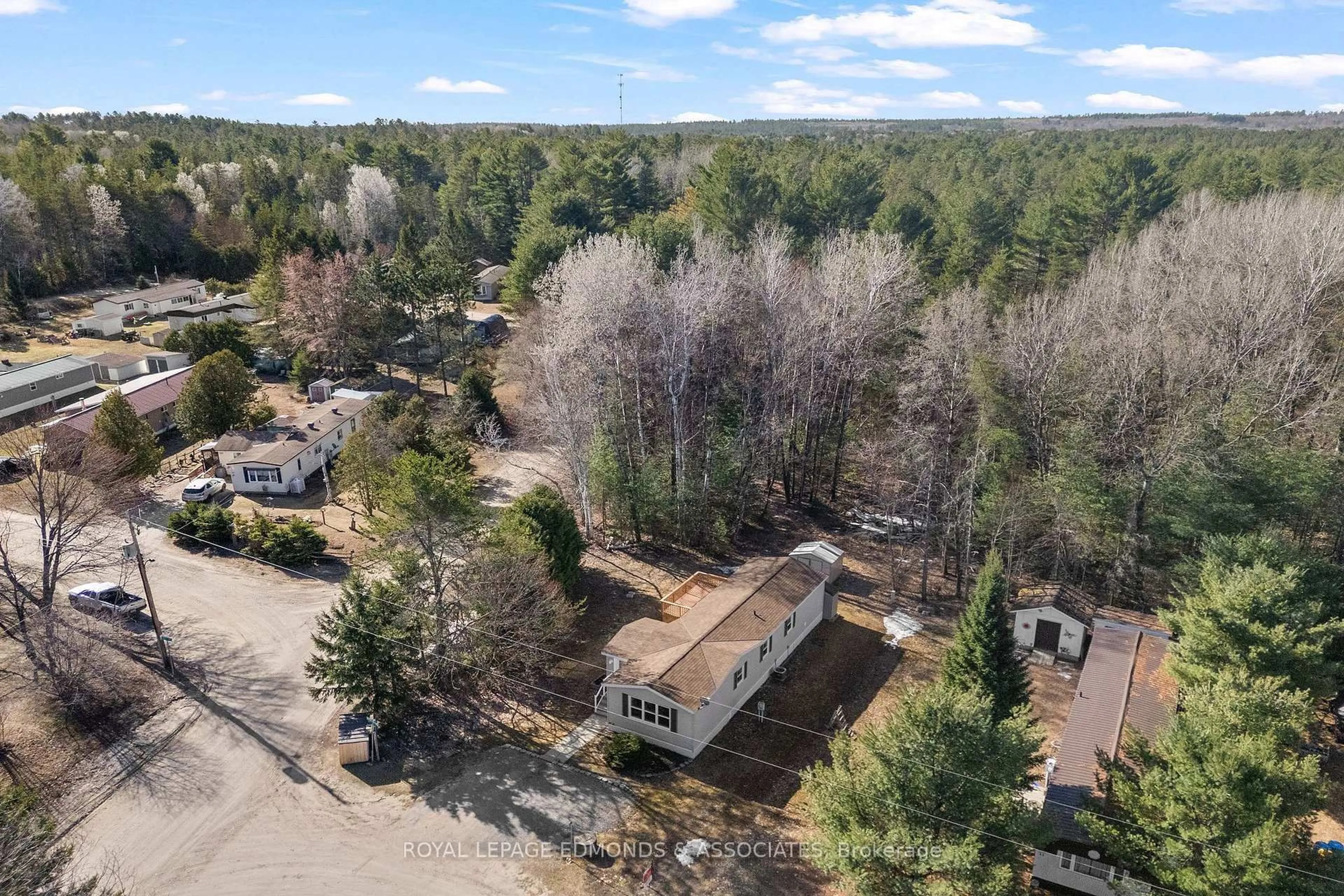 A pic from outside/outdoor area/front of a property/back of a property/a pic from drone, forest/trees view for 5 Hunters Run Lane, Chalk River Ontario K0J 1J0