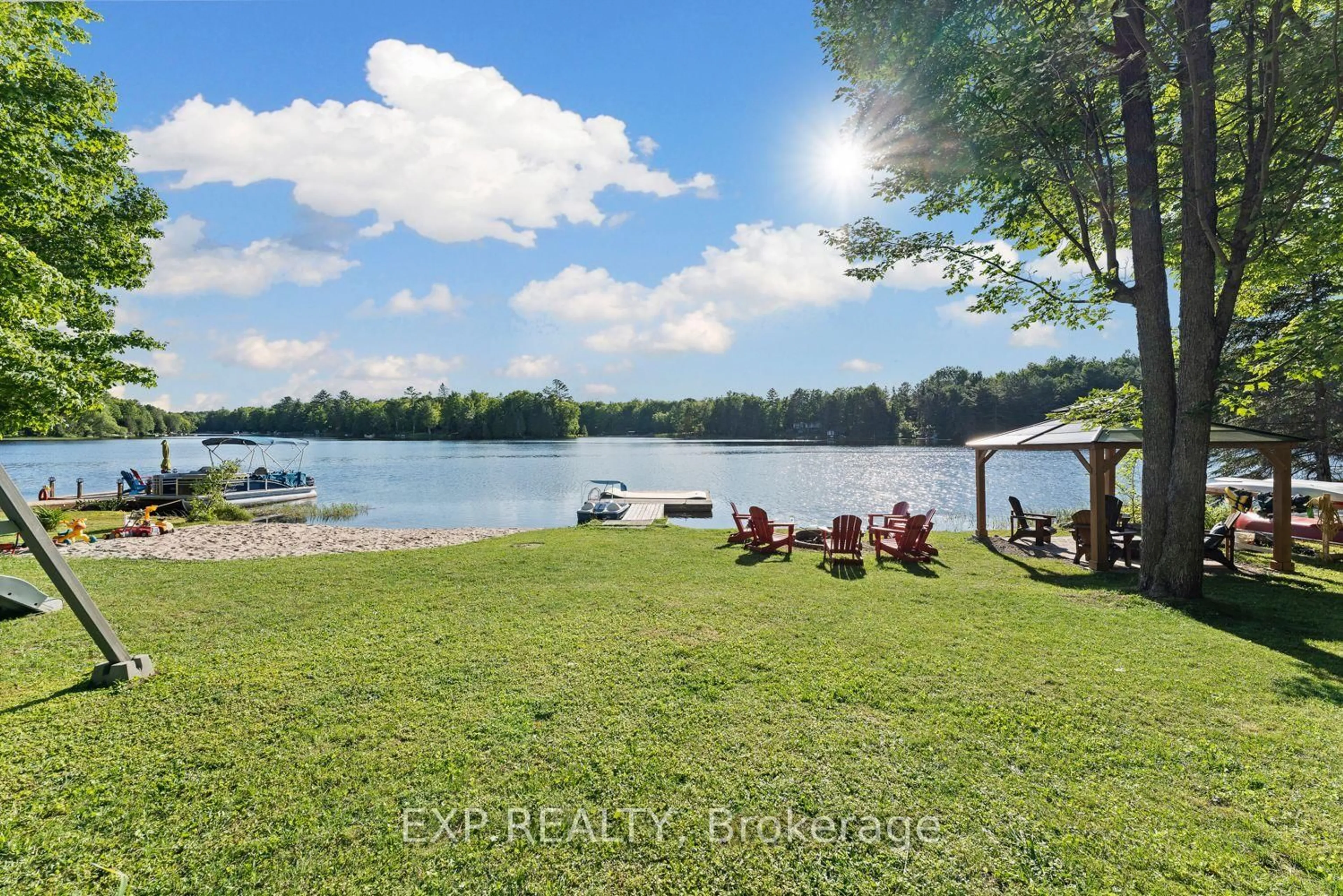 A pic from outside/outdoor area/front of a property/back of a property/a pic from drone, water/lake/river/ocean view for 25 Fire Rt. 296, Trent Lakes Ontario K0L 1J0