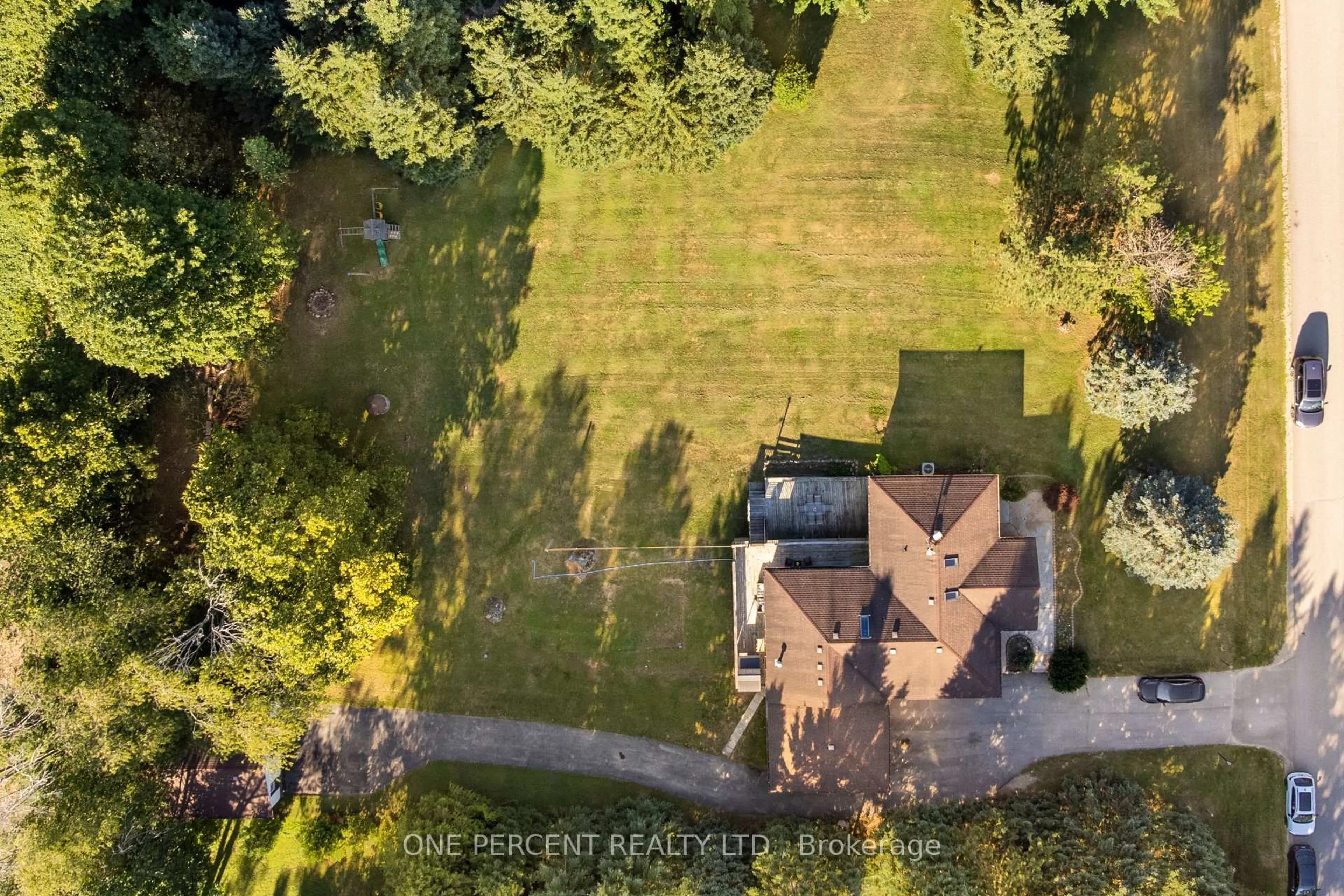 A pic from outside/outdoor area/front of a property/back of a property/a pic from drone, forest/trees view for 10 Campbell Rd, Mono Ontario L9W 5R4