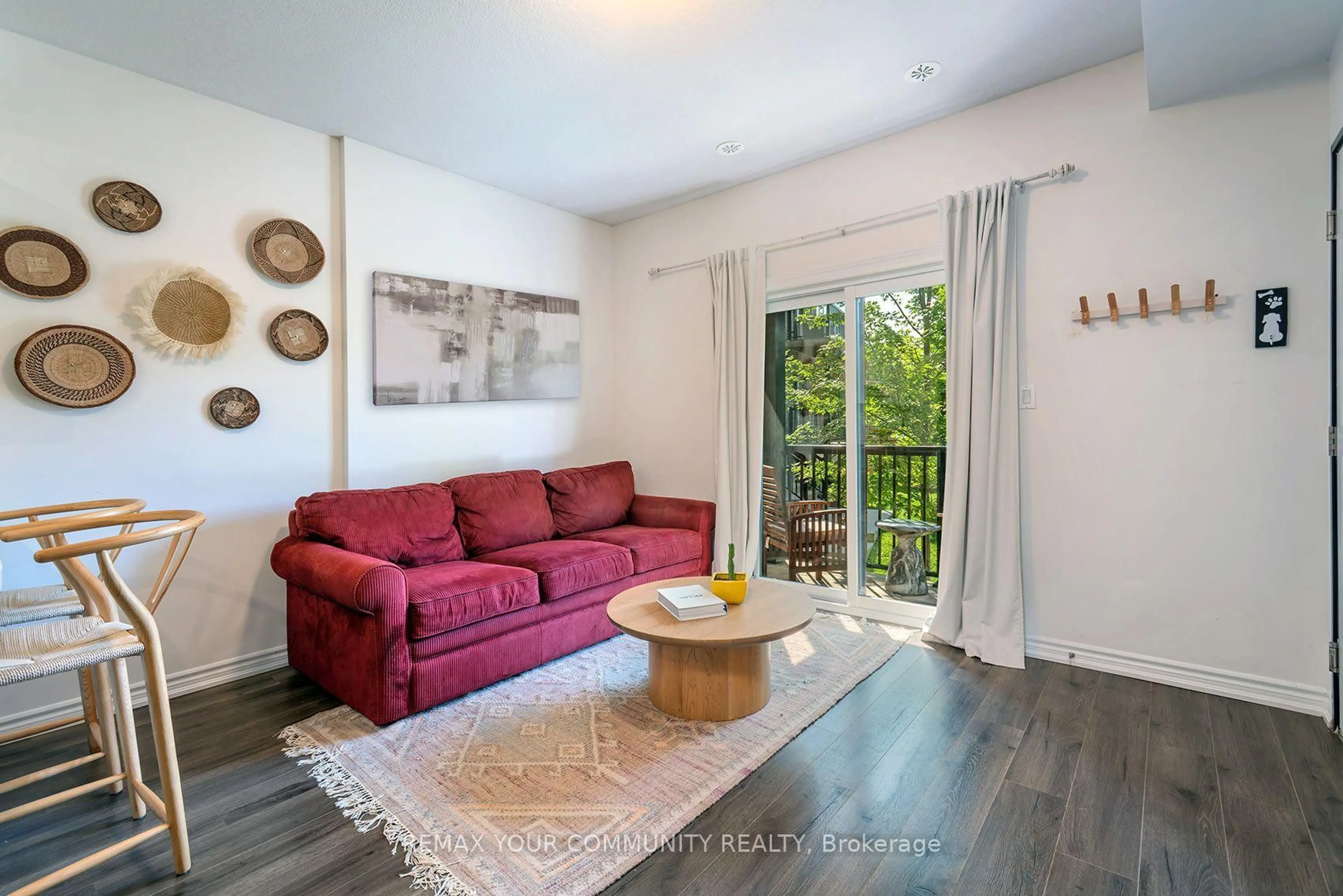 Living room with furniture, wood/laminate floor for 164 Heiman St #6B, Kitchener Ontario N2M 0B8