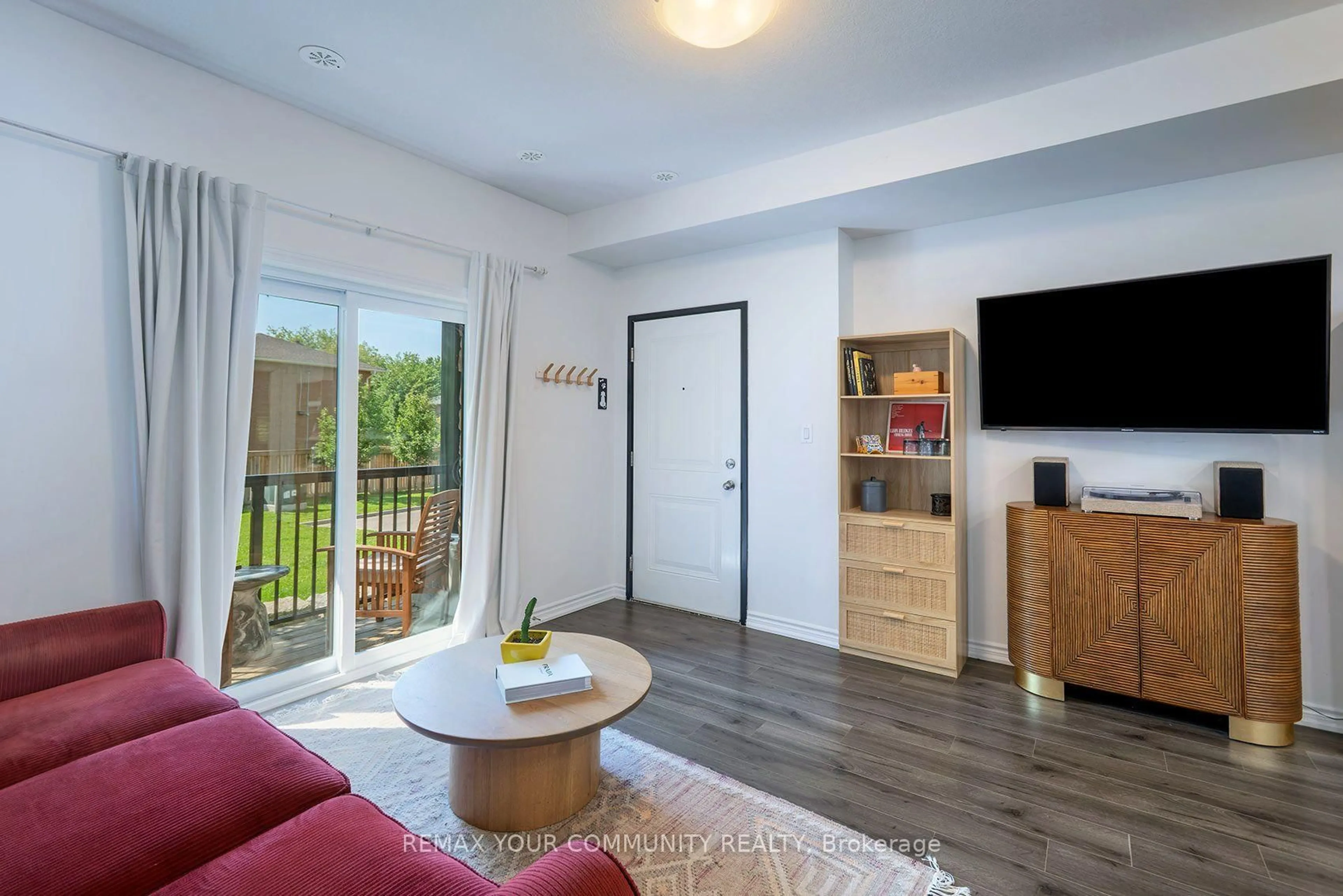 Living room with furniture, wood/laminate floor for 164 Heiman St #6B, Kitchener Ontario N2M 0B8
