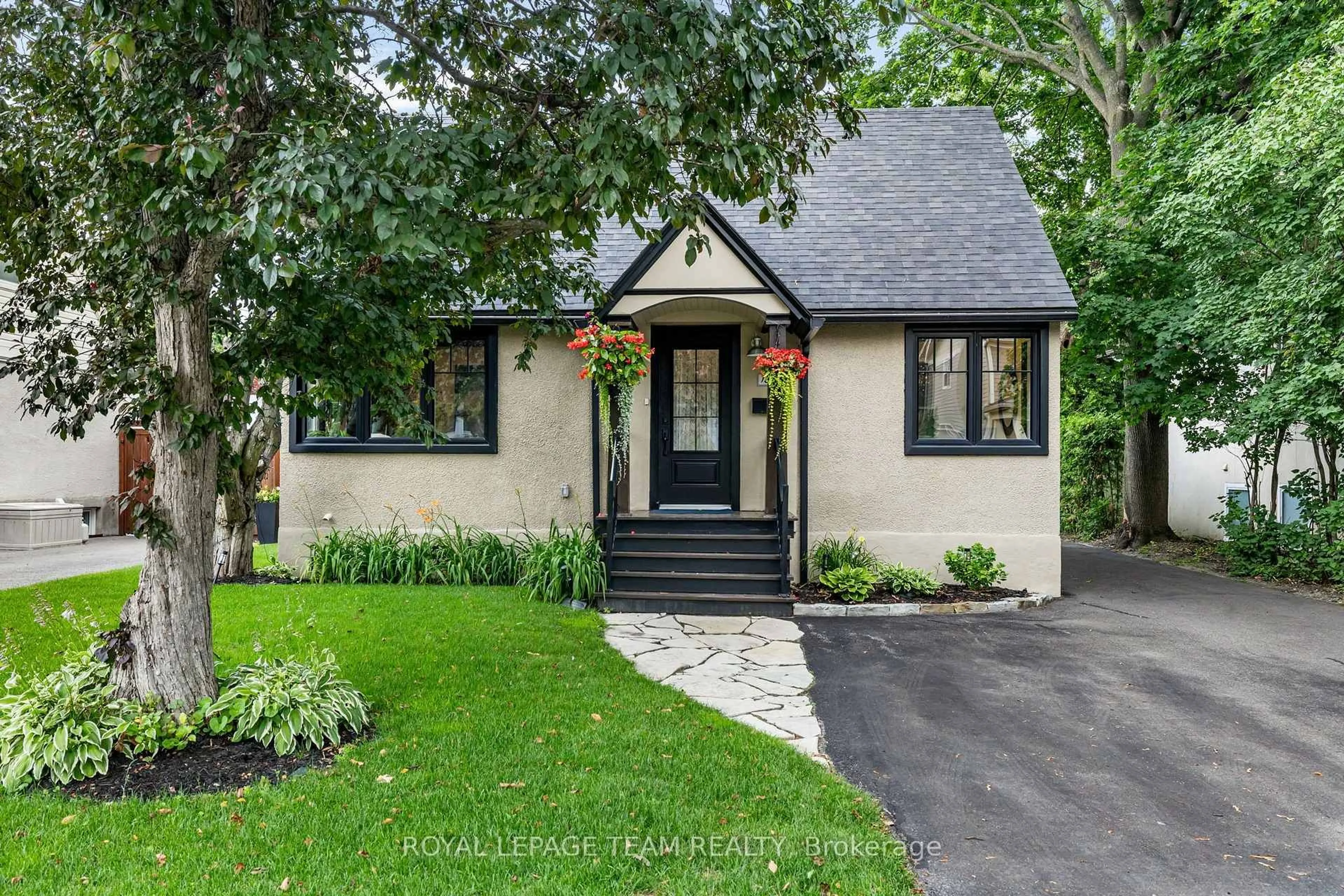 Home with brick exterior material, street for 185 Camelia Ave, Ottawa Ontario K1K 2X7