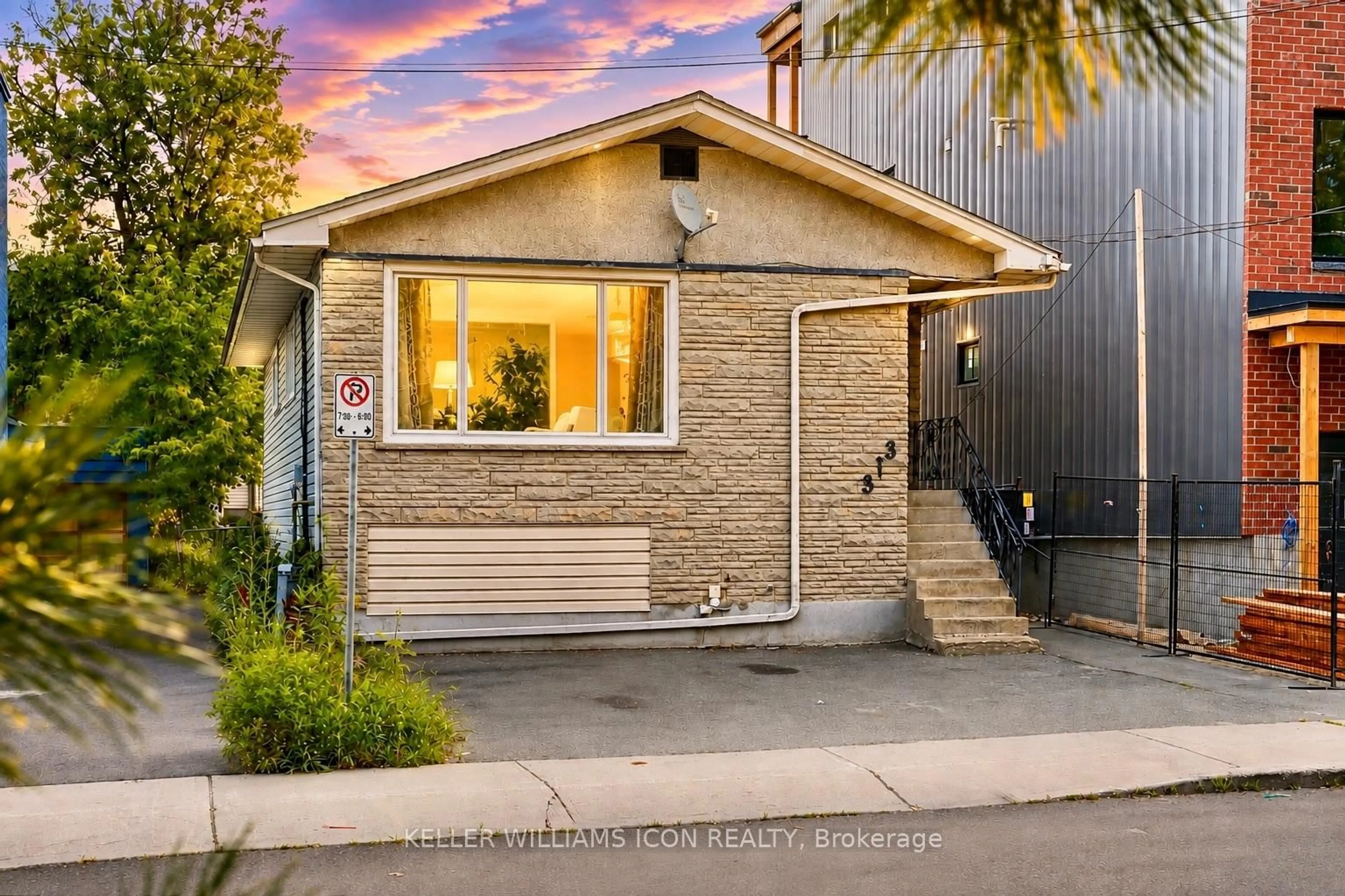 Home with brick exterior material, street for 313 Savard Ave, Ottawa Ontario K1L 7S1