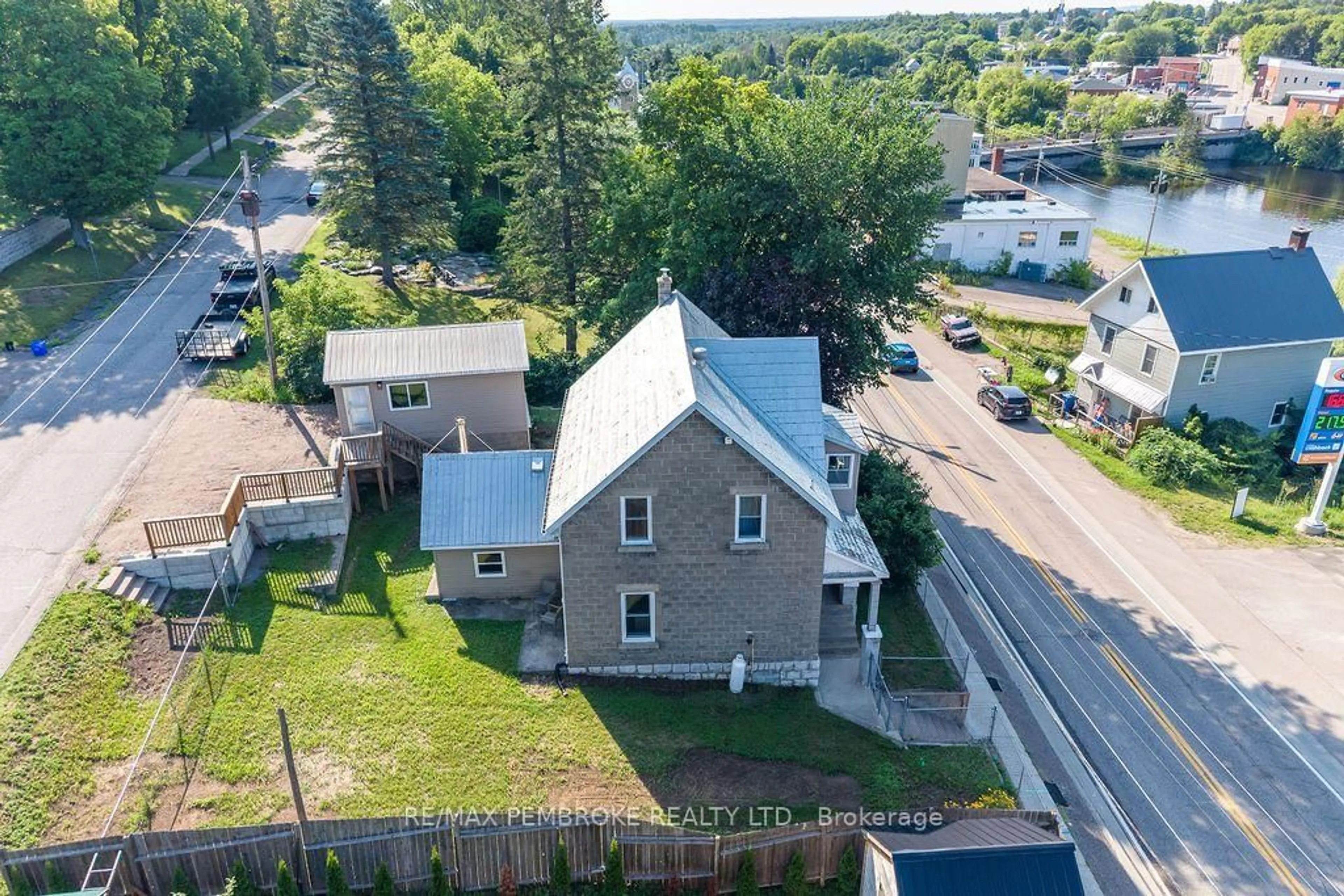 A pic from outside/outdoor area/front of a property/back of a property/a pic from drone, street for 131 Bonnechere St, Eganville Ontario K0J 1T0
