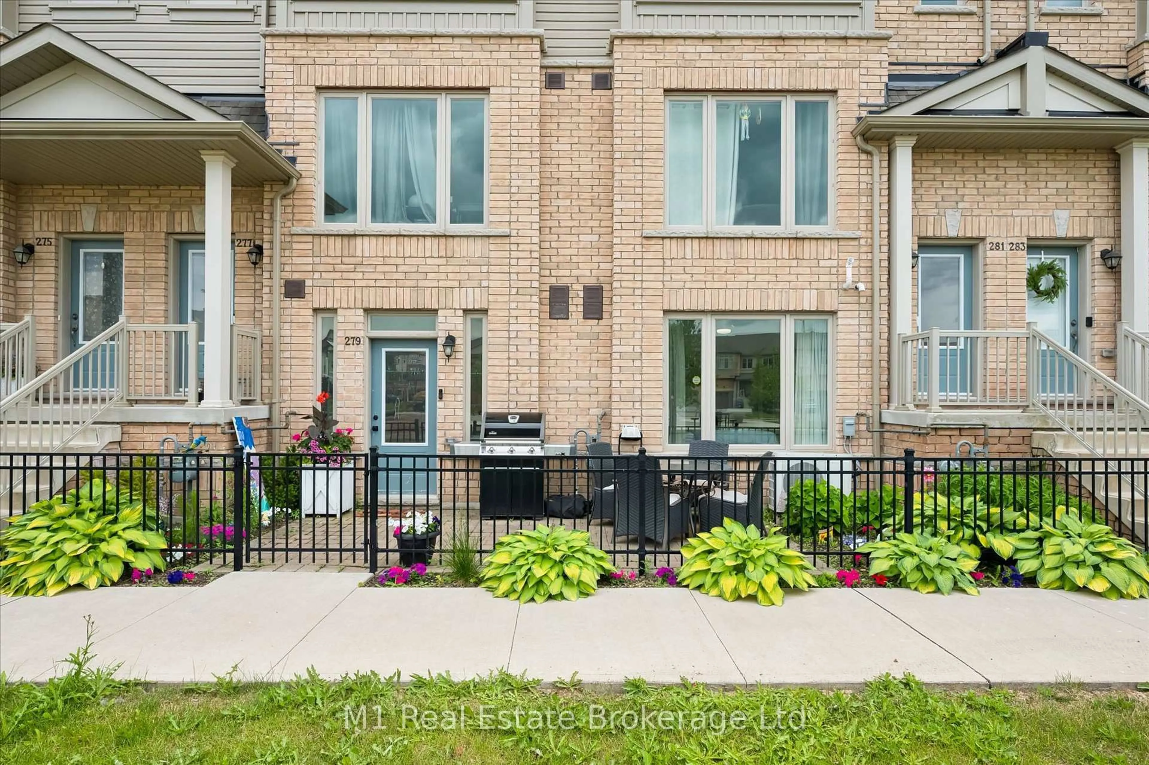 Home with brick exterior material, street for 279 Law Dr, Guelph Ontario N1E 7E8