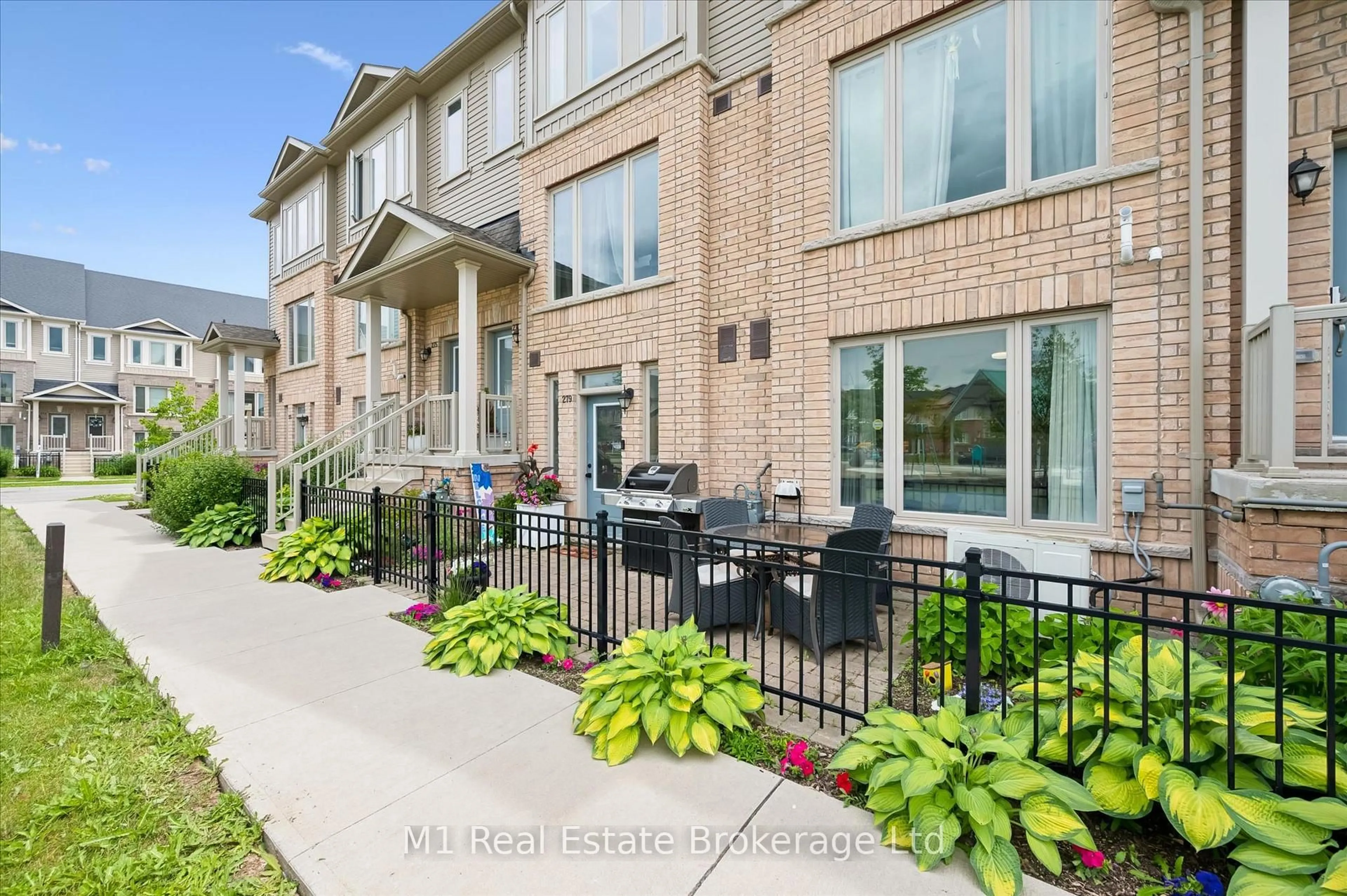 Home with brick exterior material, street for 279 Law Dr, Guelph Ontario N1E 7E8
