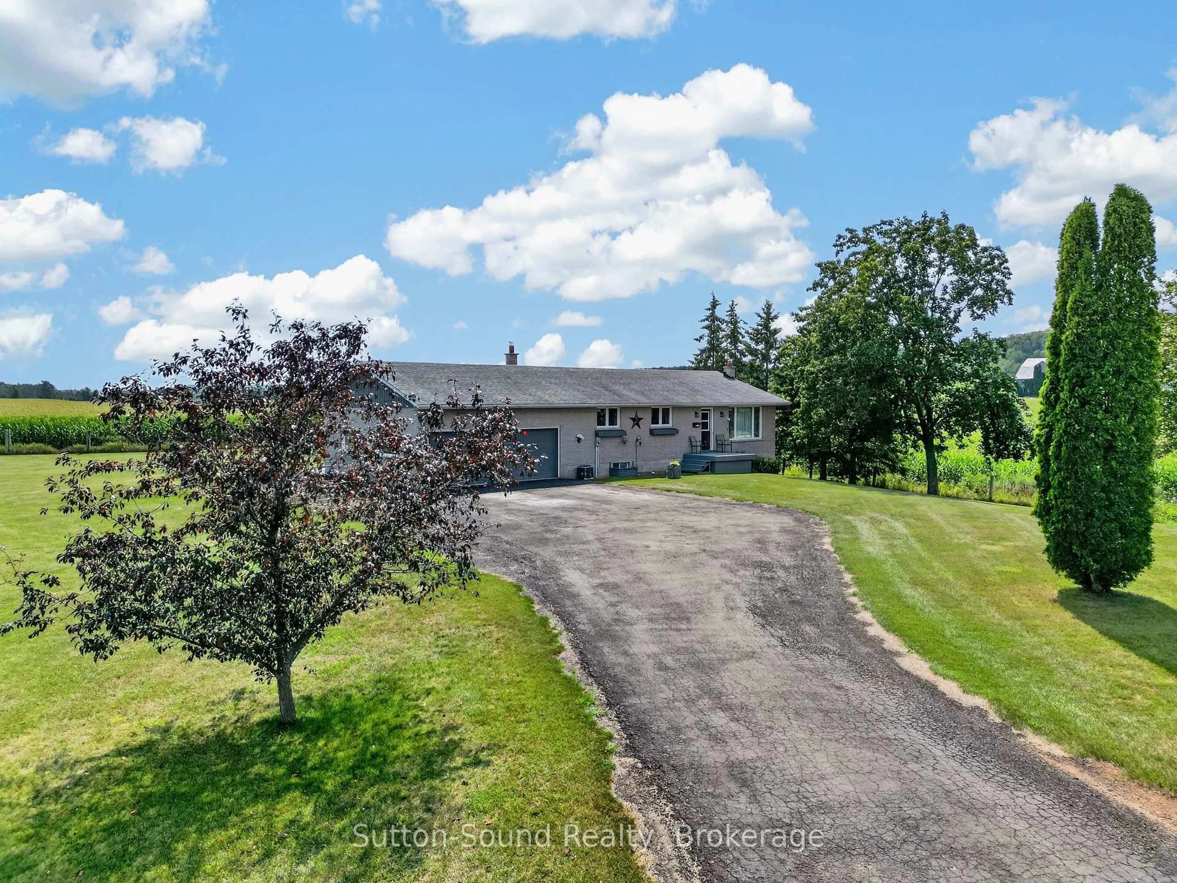 A pic from outside/outdoor area/front of a property/back of a property/a pic from drone, water/lake/river/ocean view for 383256 DAWSON Rd, Georgian Bluffs Ontario N0H 1S0