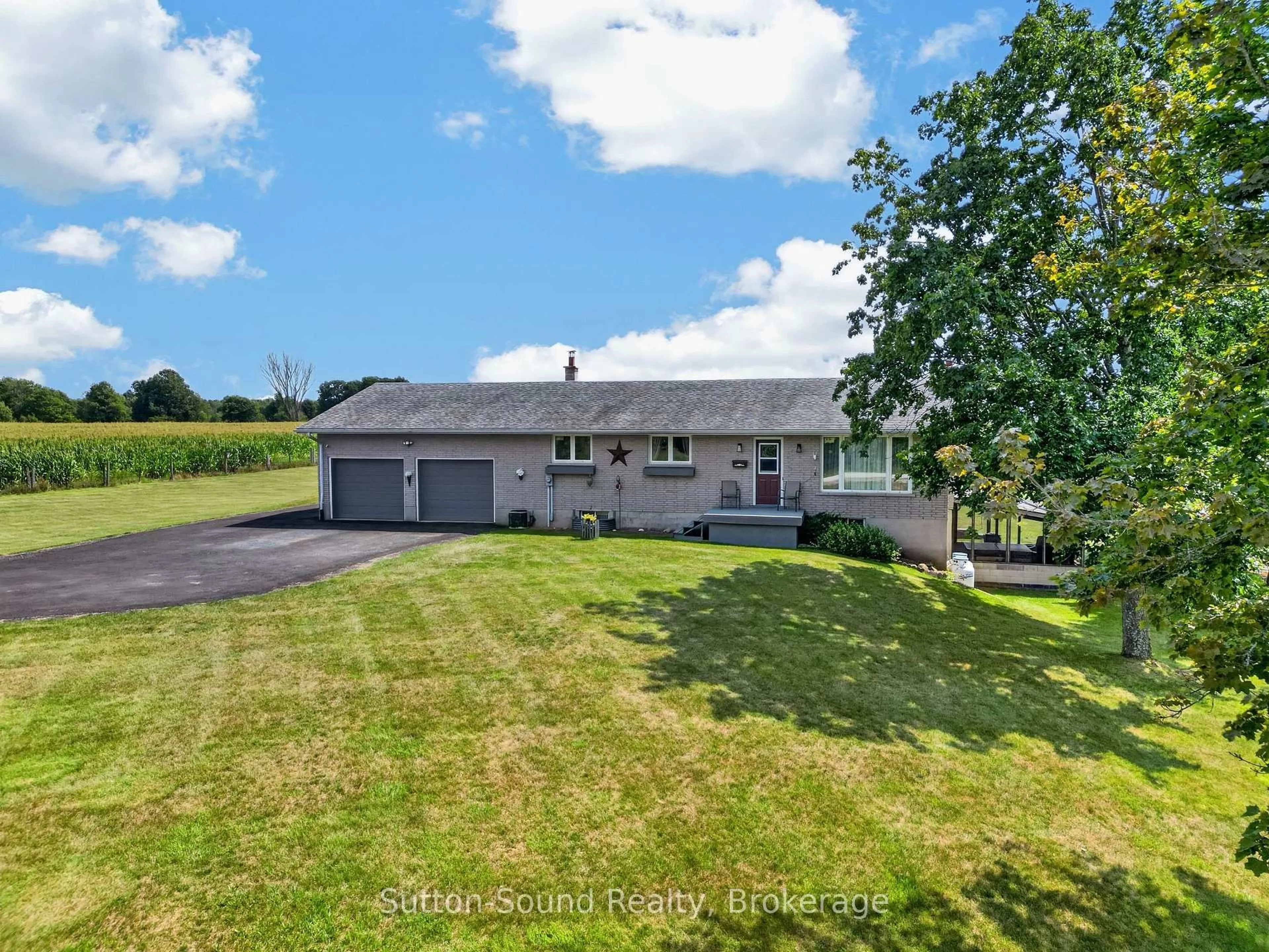 A pic from outside/outdoor area/front of a property/back of a property/a pic from drone, water/lake/river/ocean view for 383256 DAWSON Rd, Georgian Bluffs Ontario N0H 1S0