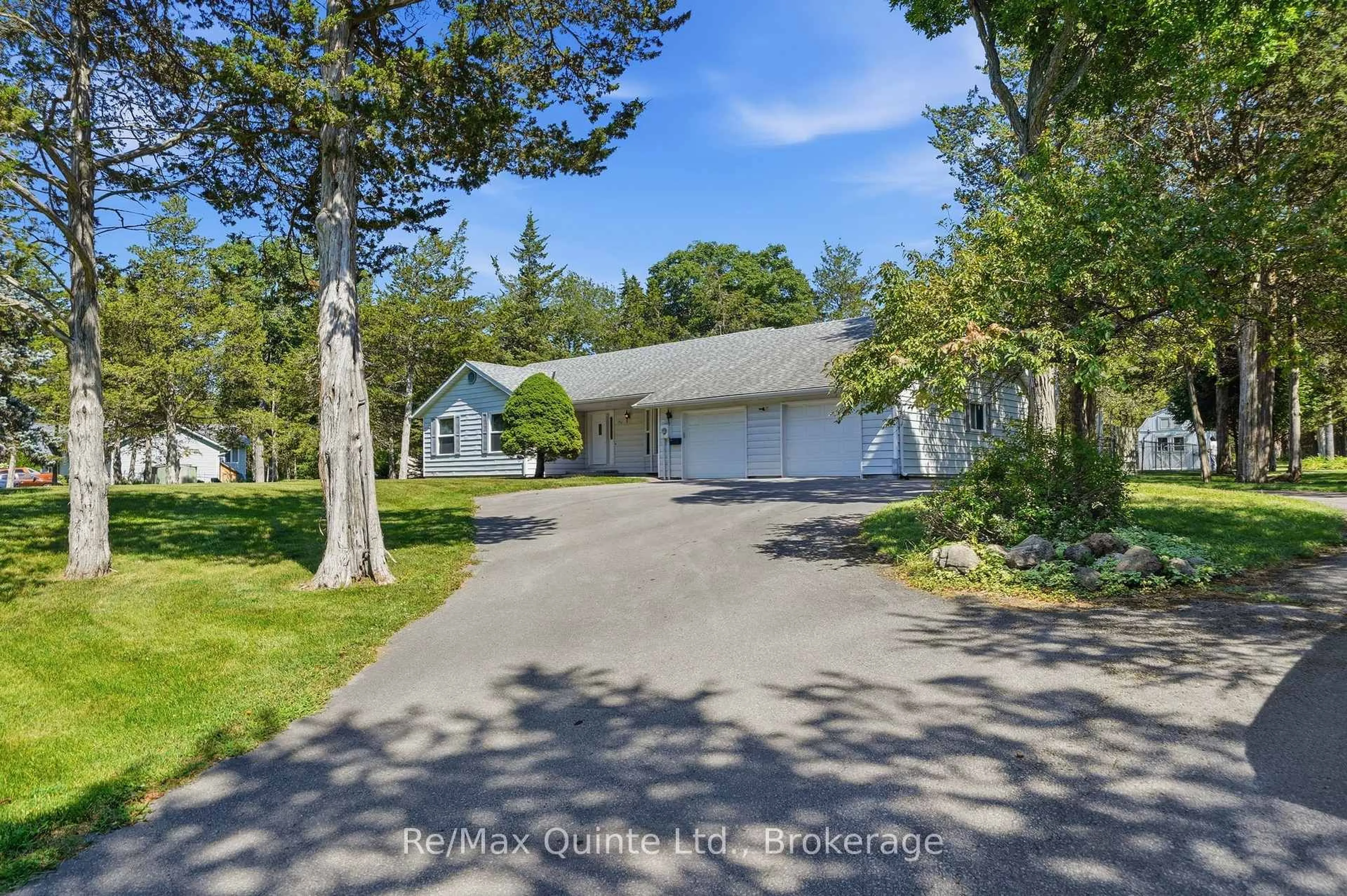 A pic from outside/outdoor area/front of a property/back of a property/a pic from drone, street for 1076 Massassauga Rd, Prince Edward County Ontario K8N 4Z7