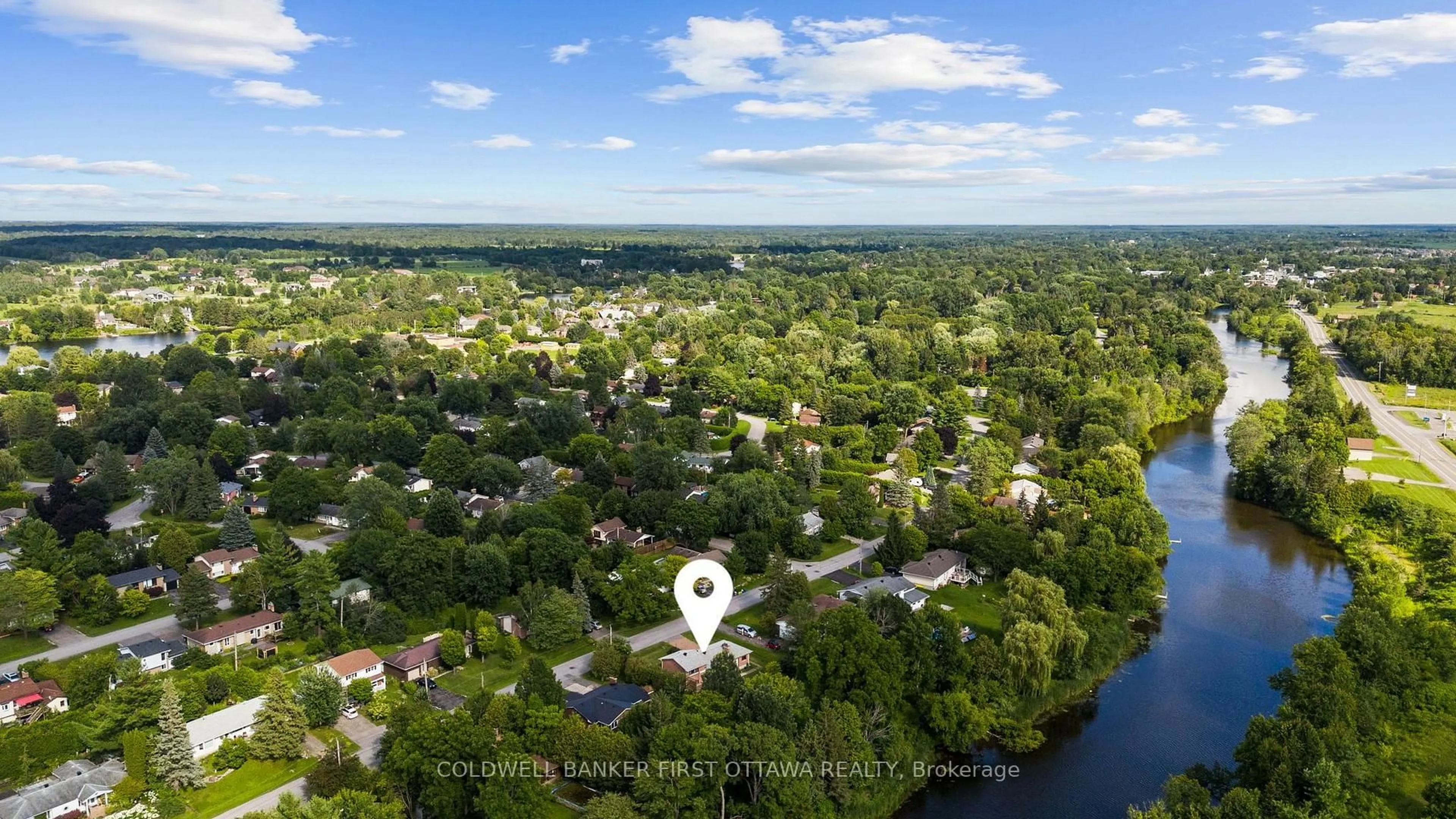 A pic from outside/outdoor area/front of a property/back of a property/a pic from drone, water/lake/river/ocean view for 5310 Mclean Cres, Manotick Ontario K4M 1E5