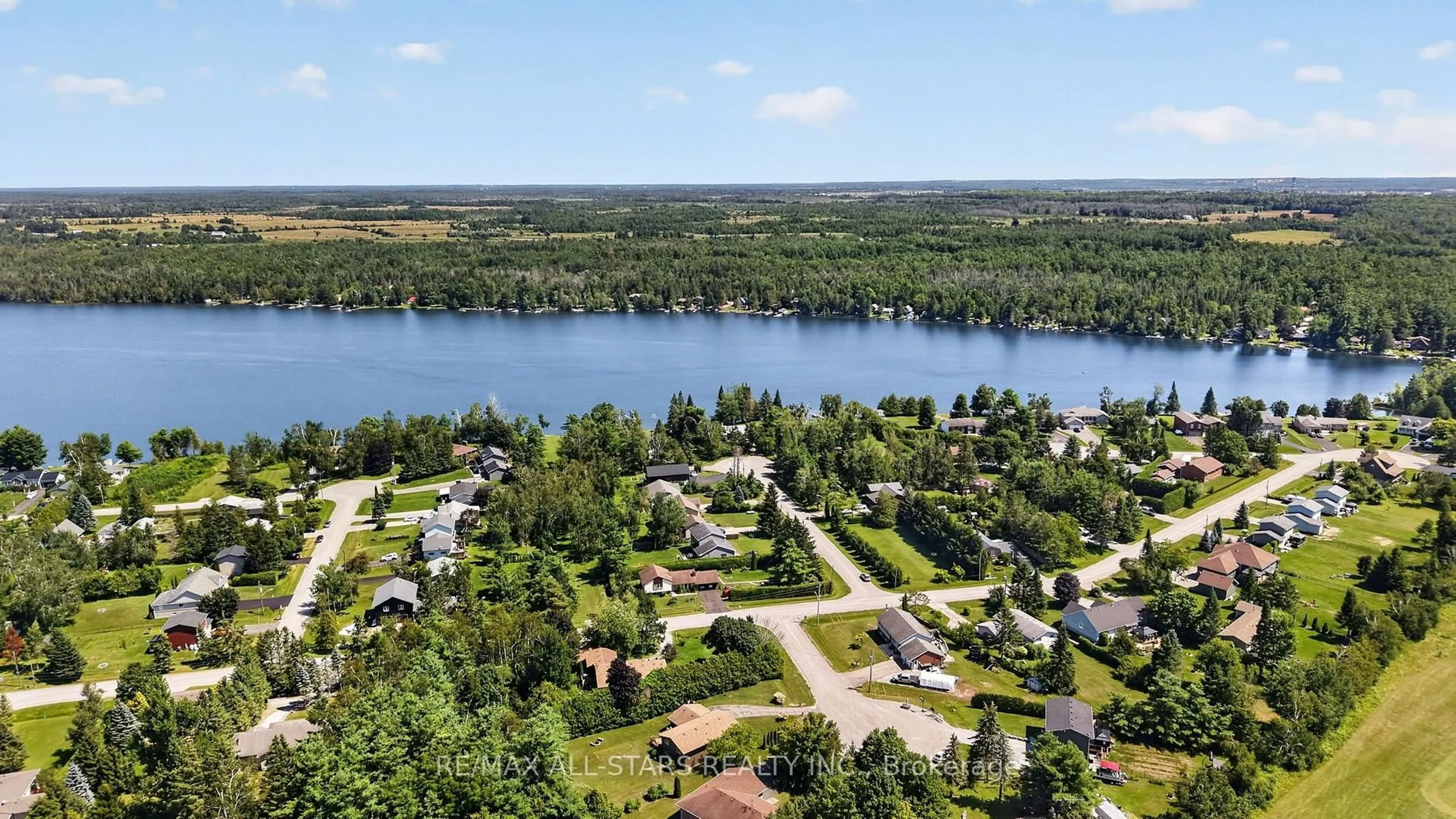 A pic from outside/outdoor area/front of a property/back of a property/a pic from drone, water/lake/river/ocean view for 6 Golf Crt, Kawartha Lakes Ontario K0M 2T0
