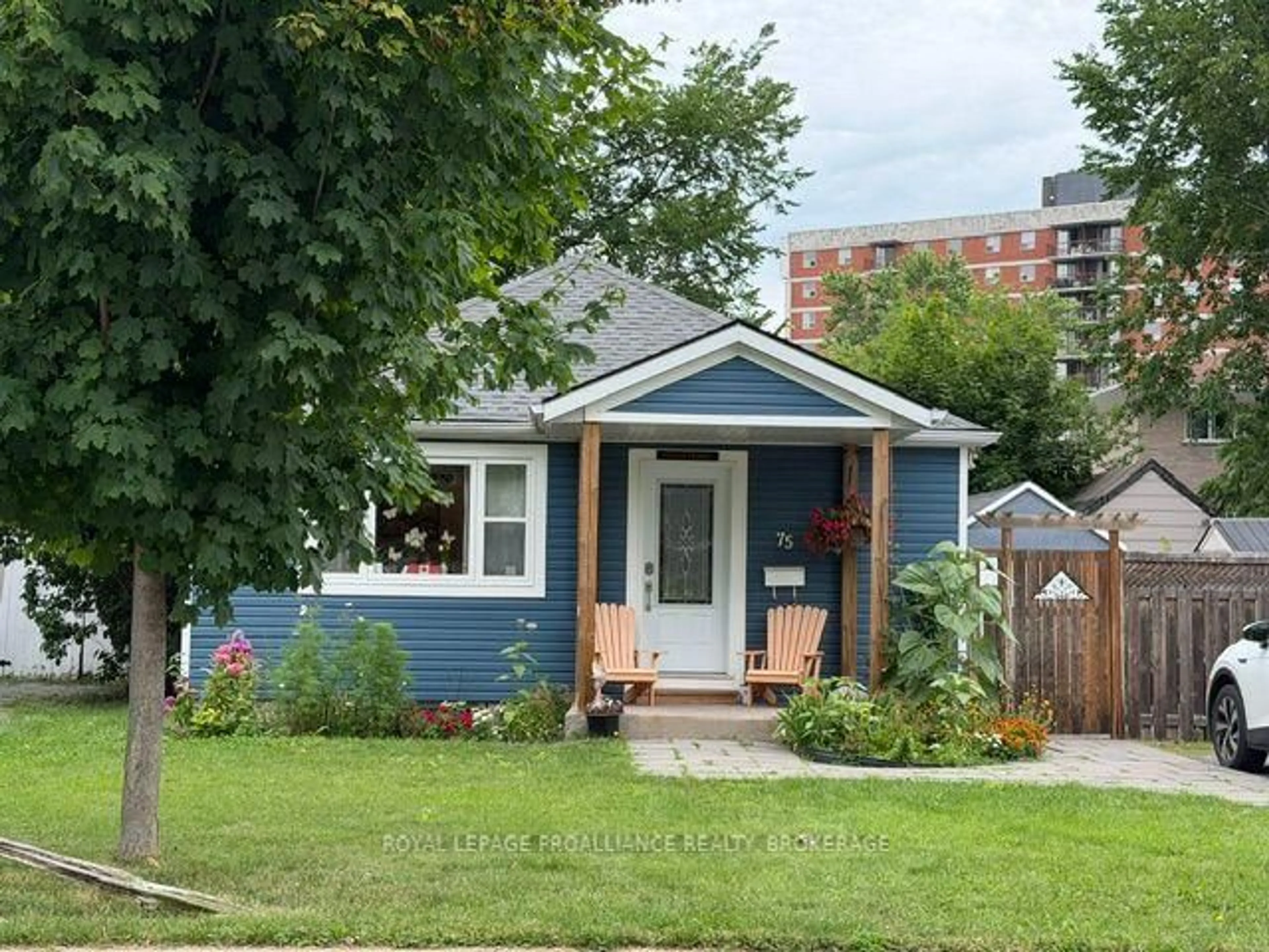 Home with vinyl exterior material, street for 75 Scott St, Kingston Ontario K7L 1L6