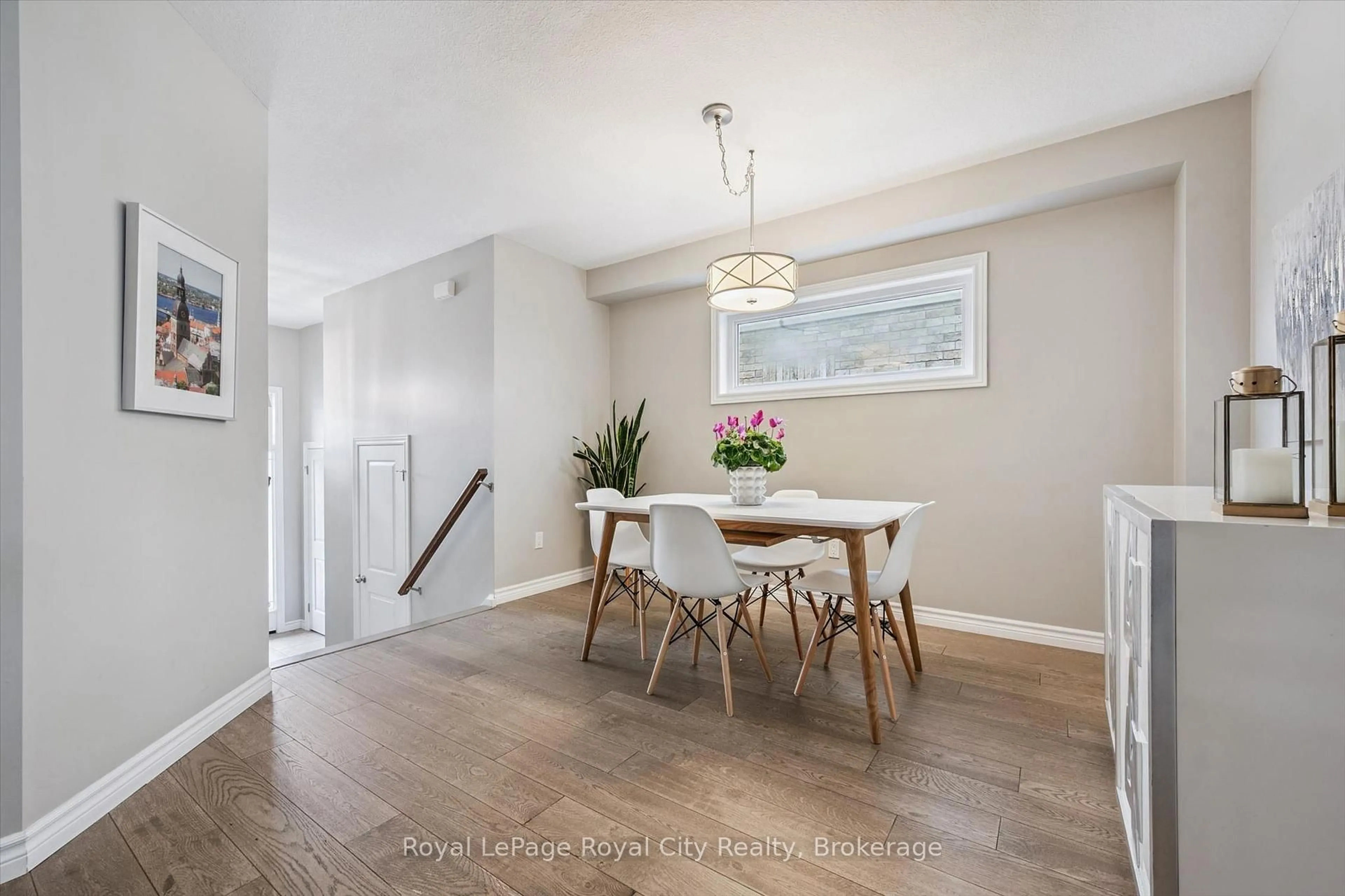 Dining room, wood/laminate floor for 144 Kemp Cres, Guelph Ontario N1E 0K1