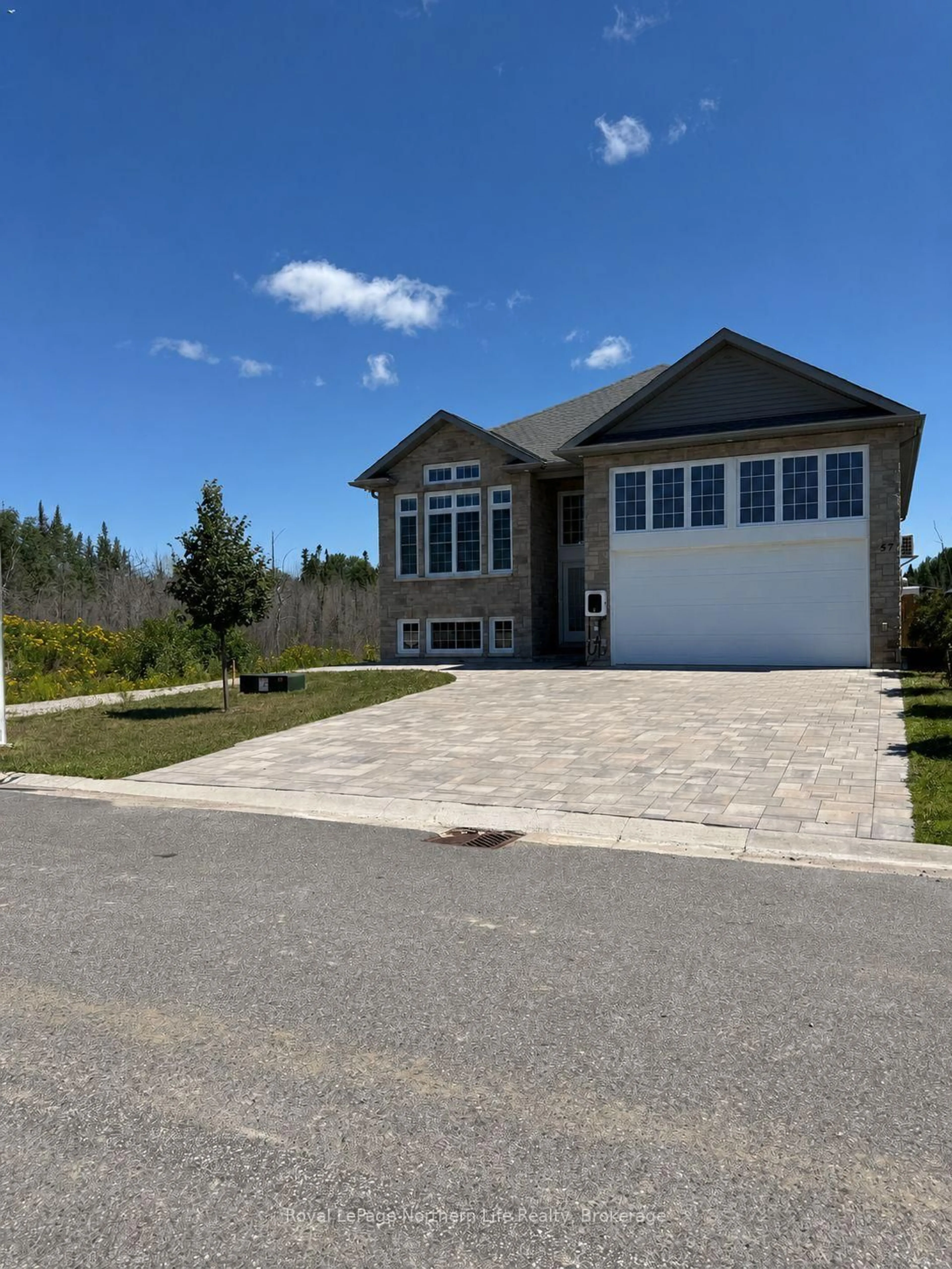 Home with vinyl exterior material, street for 57 Trilium Dr, North Bay Ontario P1A 0A1