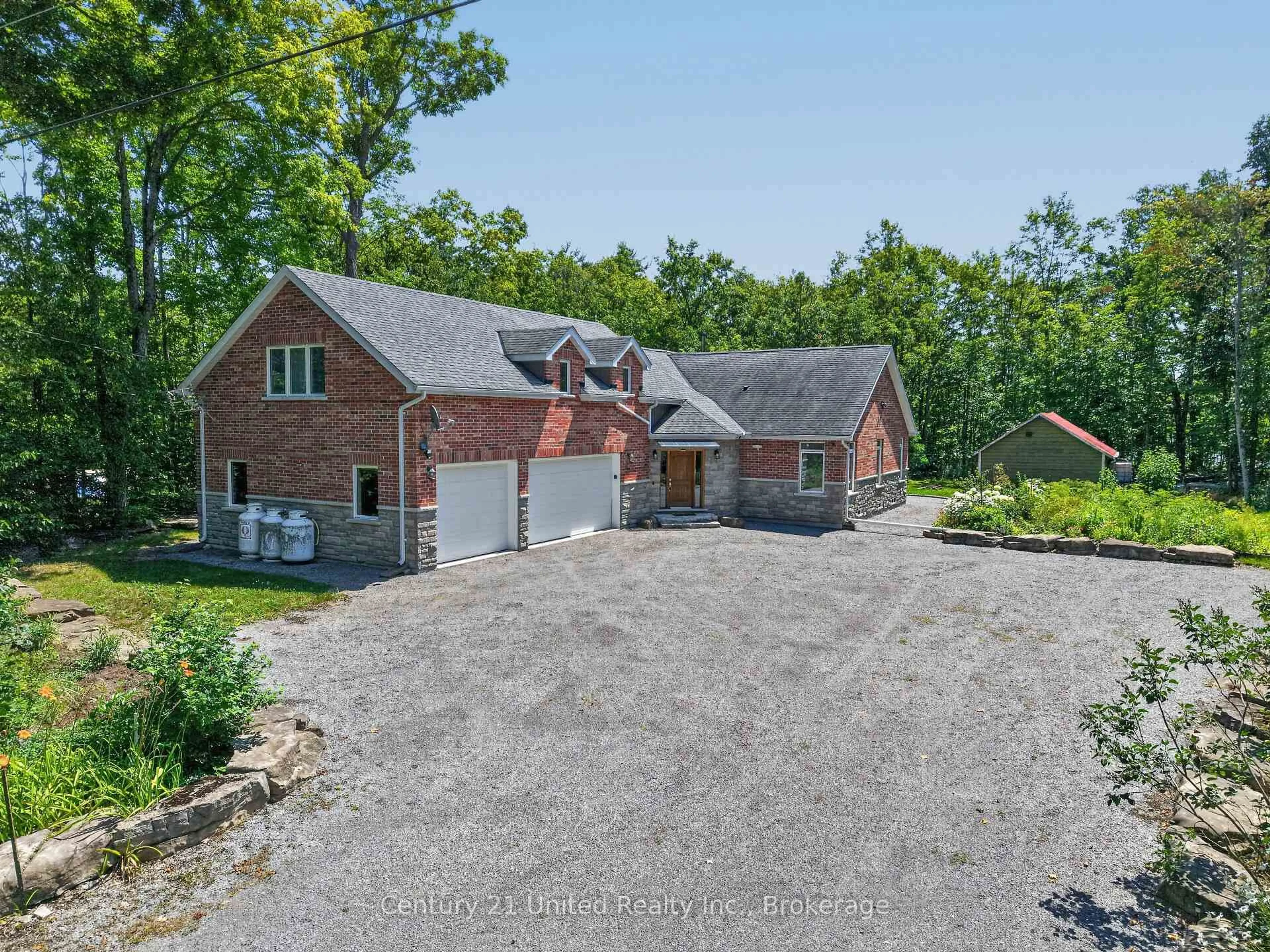 A pic from outside/outdoor area/front of a property/back of a property/a pic from drone, street for 15 Library Rd, North Kawartha Ontario K0L 3E0