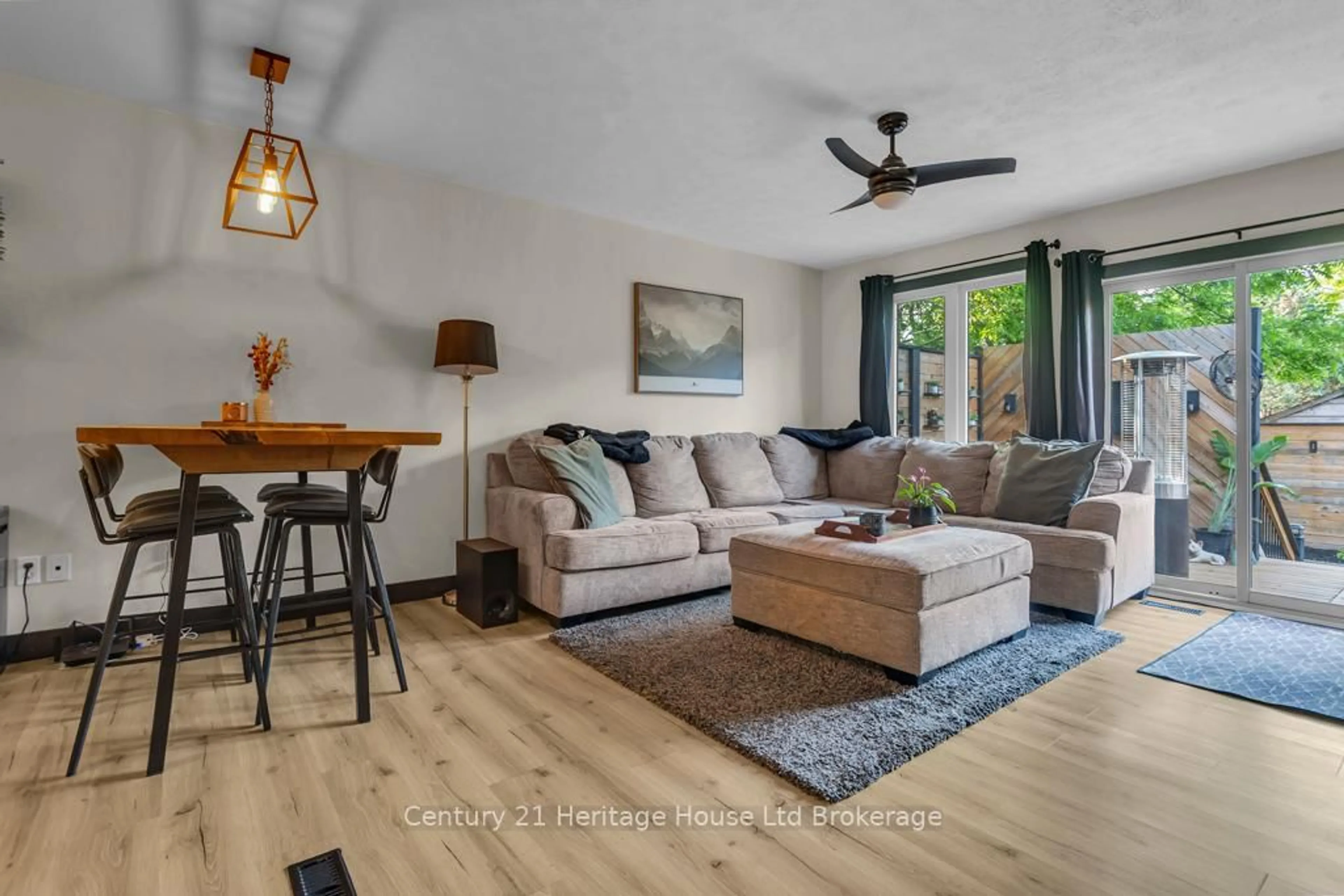 Living room with furniture, wood/laminate floor for 14 Herford St, Tillsonburg Ontario N4G 4V2