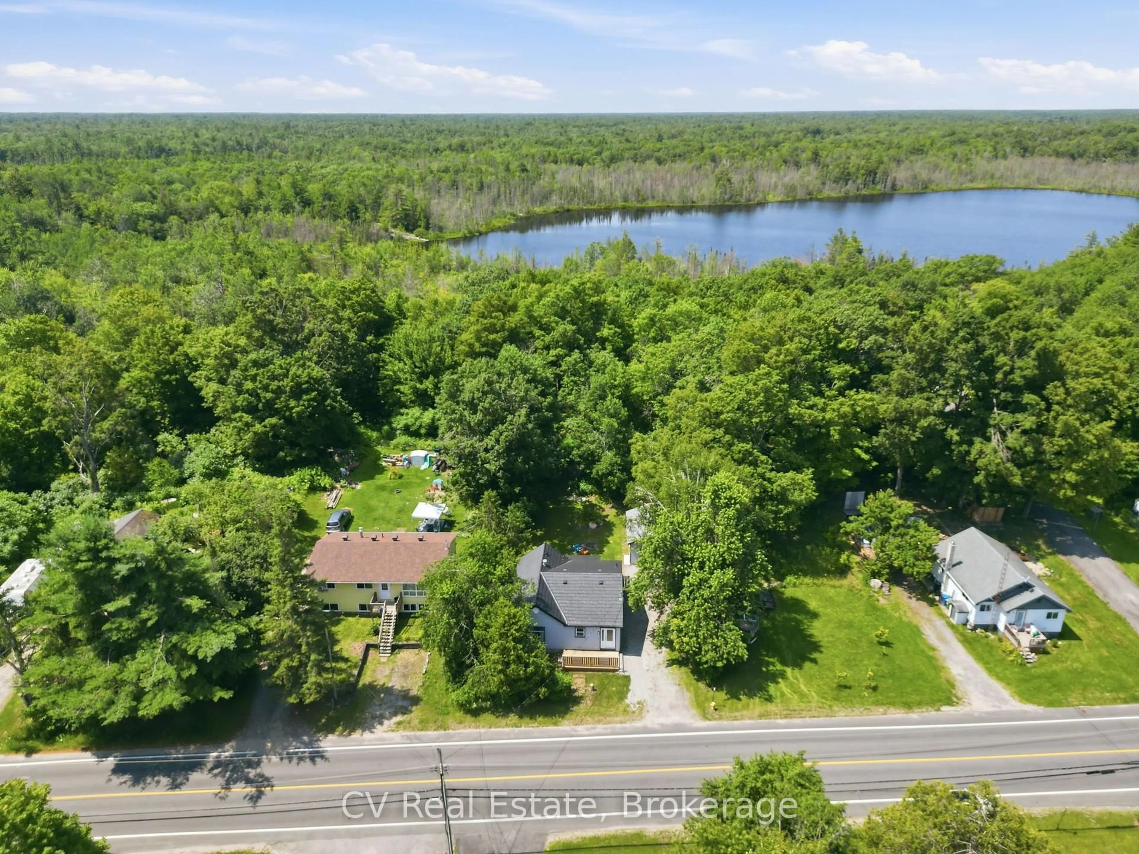A pic from outside/outdoor area/front of a property/back of a property/a pic from drone, water/lake/river/ocean view for 309 High St, Georgian Bay Ontario P0C 1H0