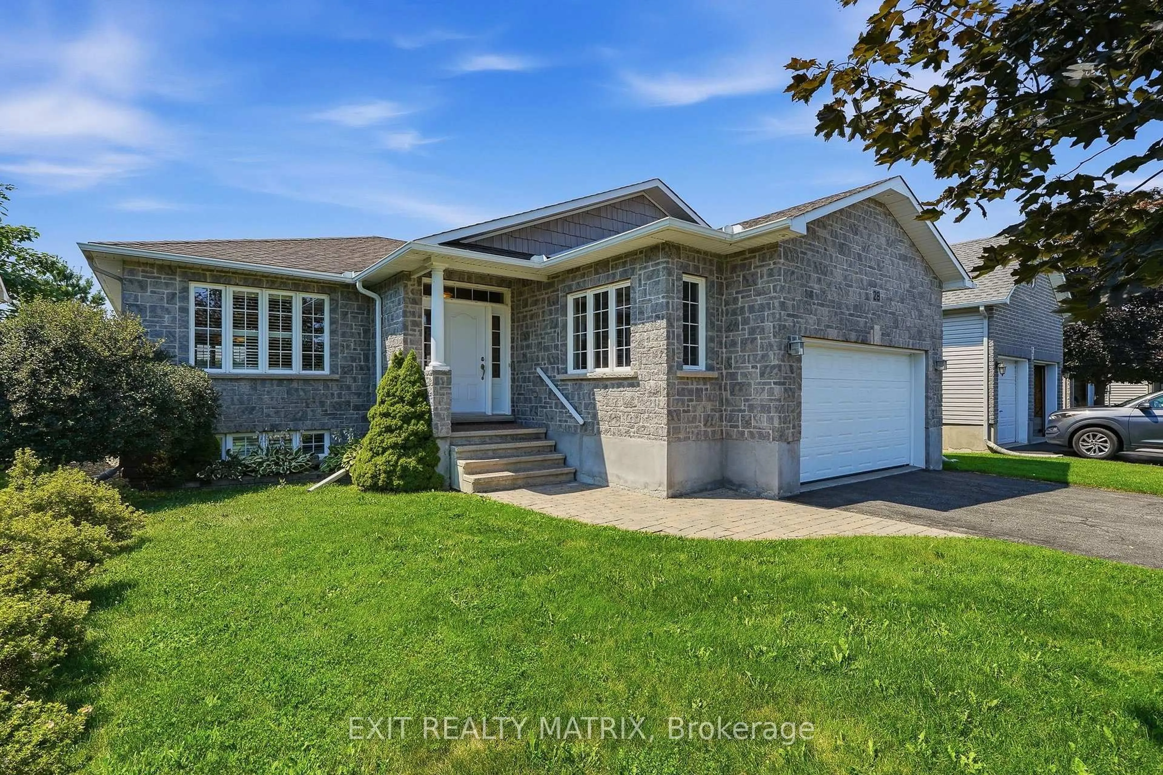 Home with brick exterior material, street for 28 Station Trail St, Russell Ontario K4R 0A3