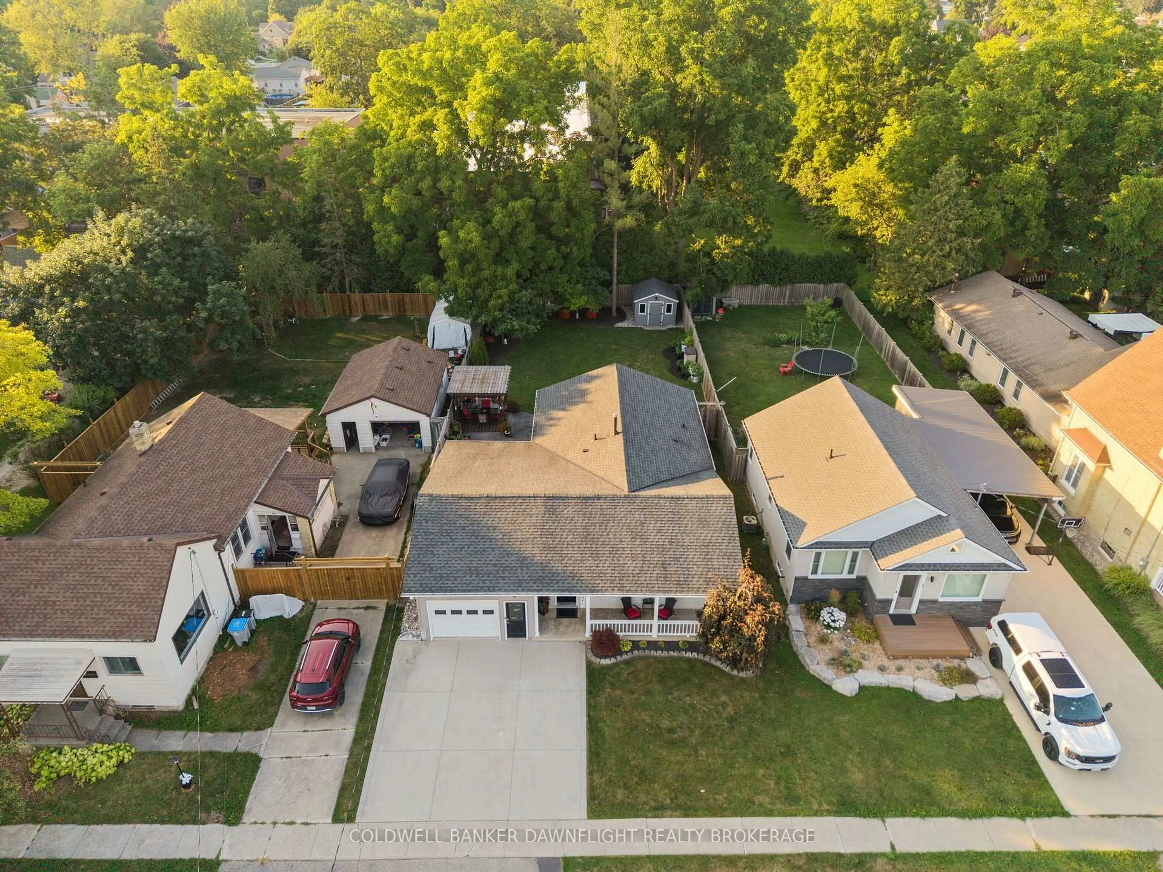 A pic from outside/outdoor area/front of a property/back of a property/a pic from drone, street for 76 Sanders St, South Huron Ontario N0M 1S2