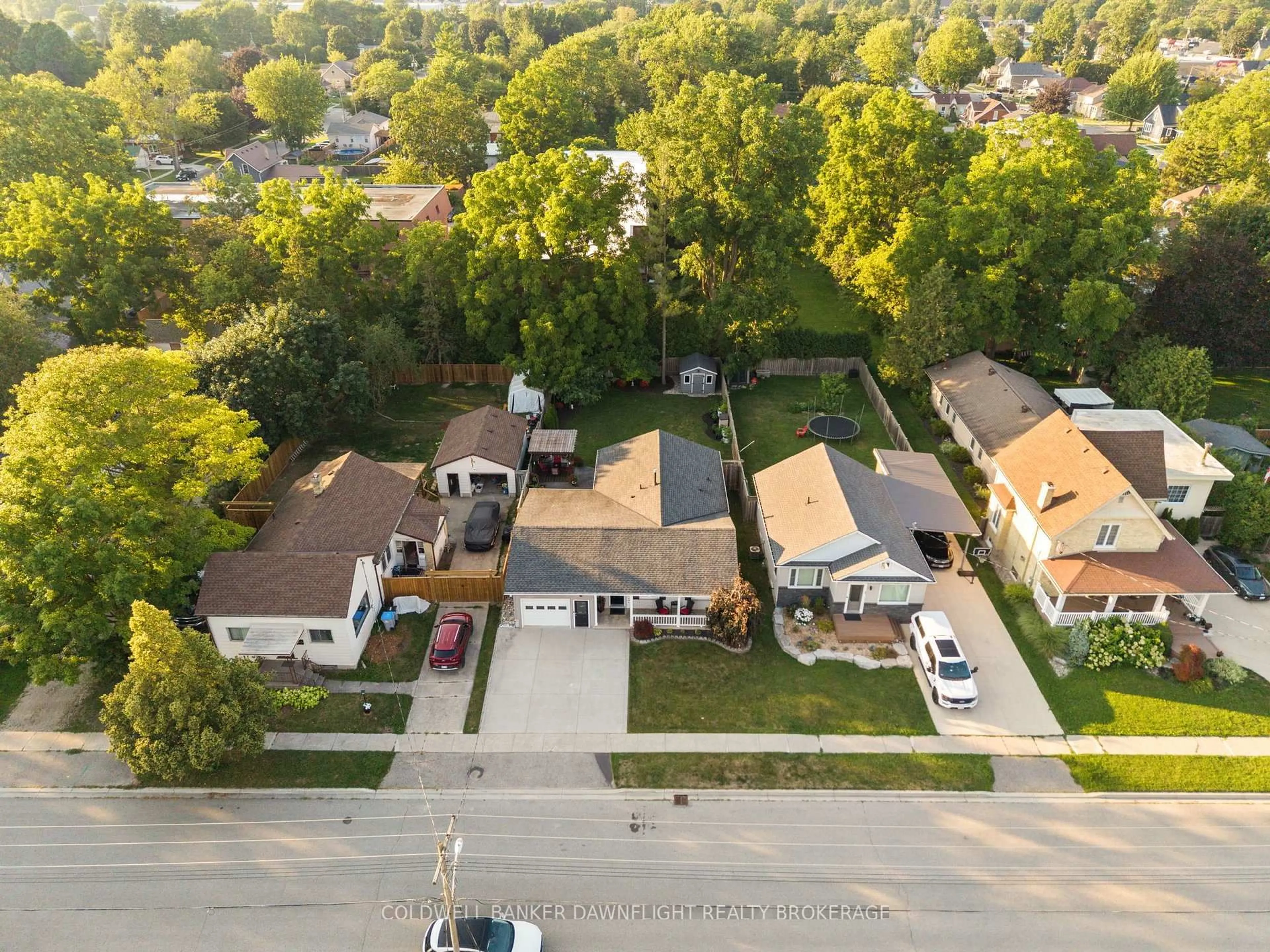 A pic from outside/outdoor area/front of a property/back of a property/a pic from drone, street for 76 Sanders St, South Huron Ontario N0M 1S2