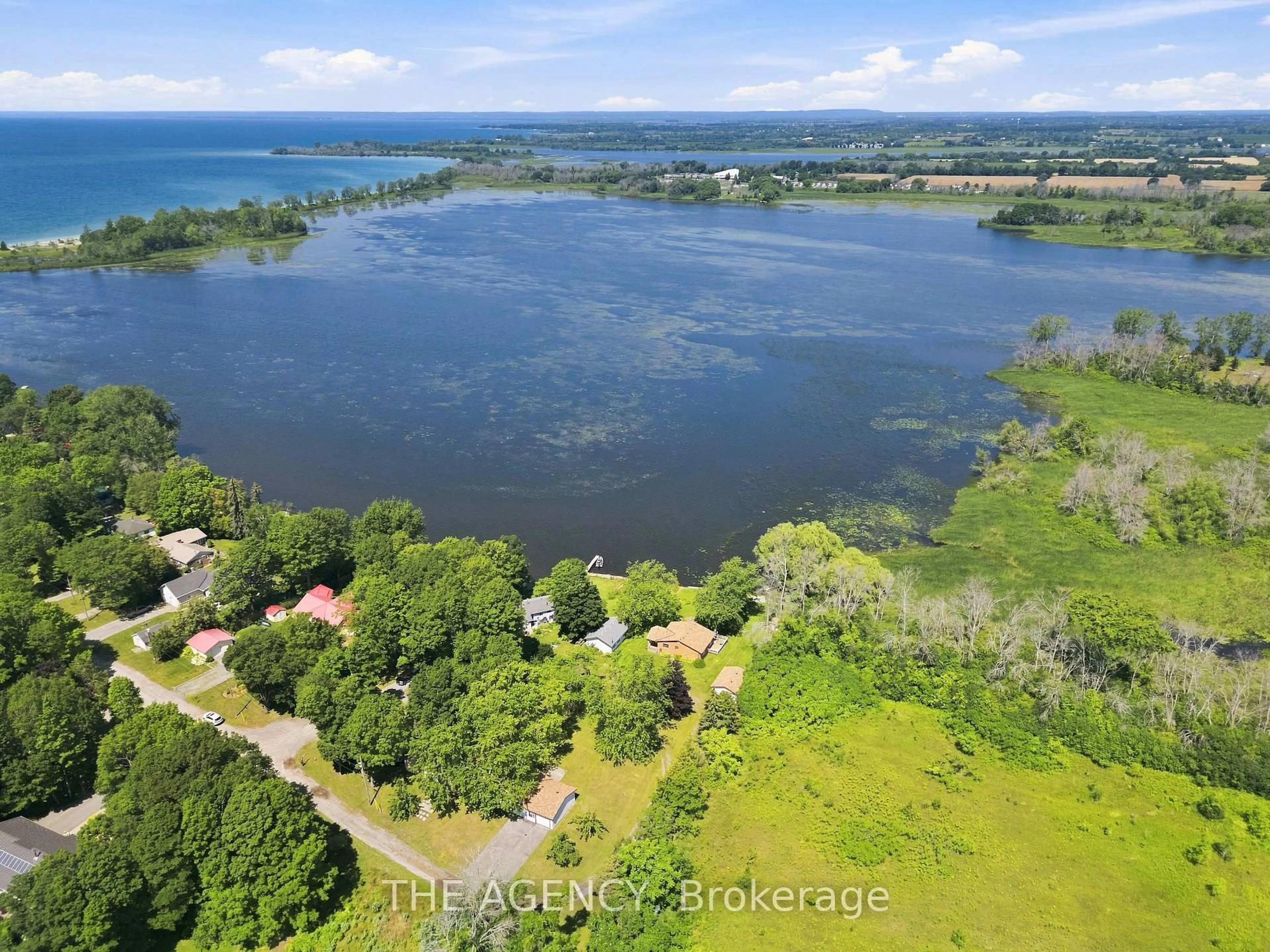 A pic from outside/outdoor area/front of a property/back of a property/a pic from drone, water/lake/river/ocean view for 151 Huycks Bay Rd, Prince Edward County Ontario K0K 2J0