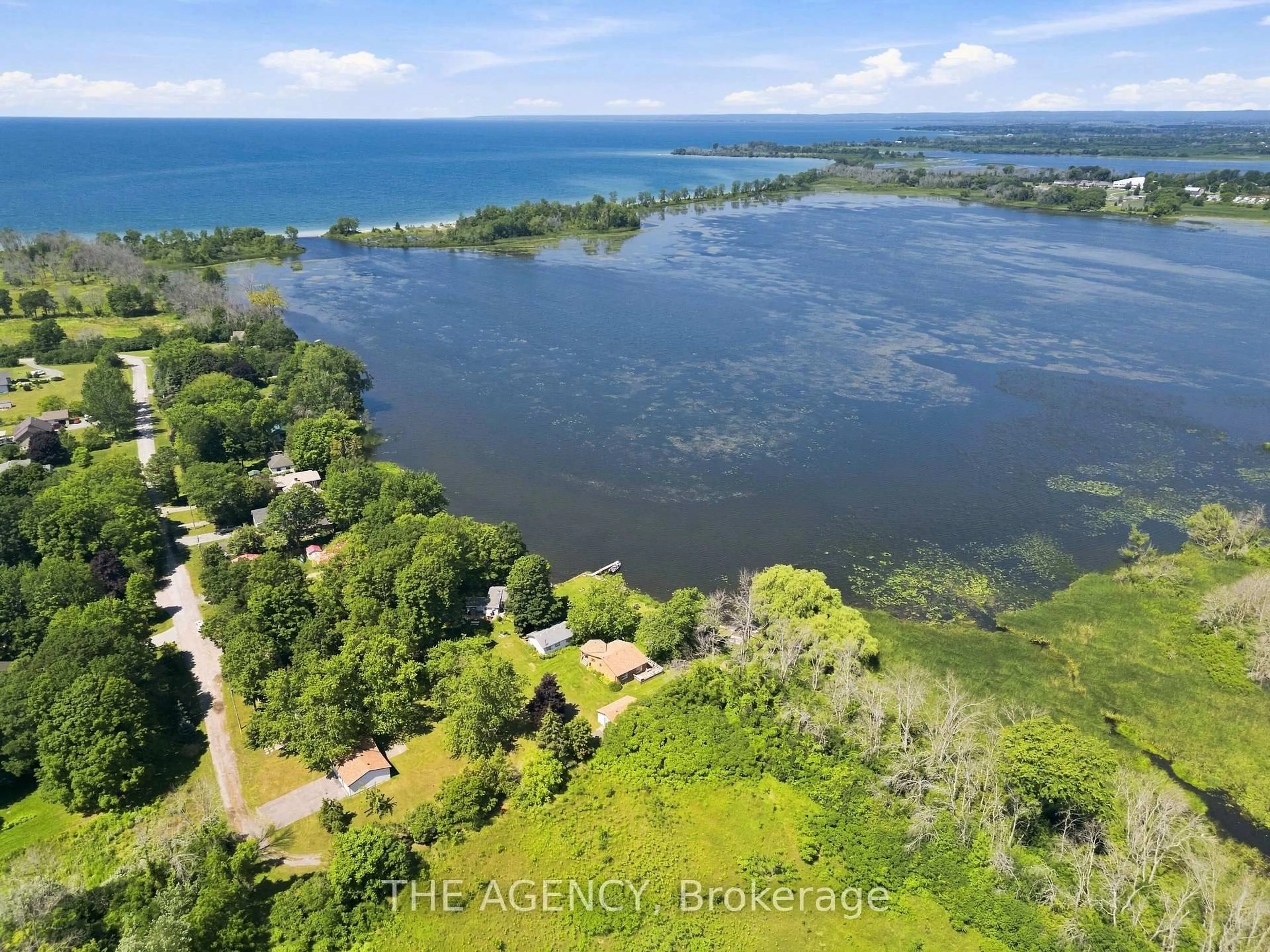 A pic from outside/outdoor area/front of a property/back of a property/a pic from drone, water/lake/river/ocean view for 151 Huycks Bay Rd, Prince Edward County Ontario K0K 2J0