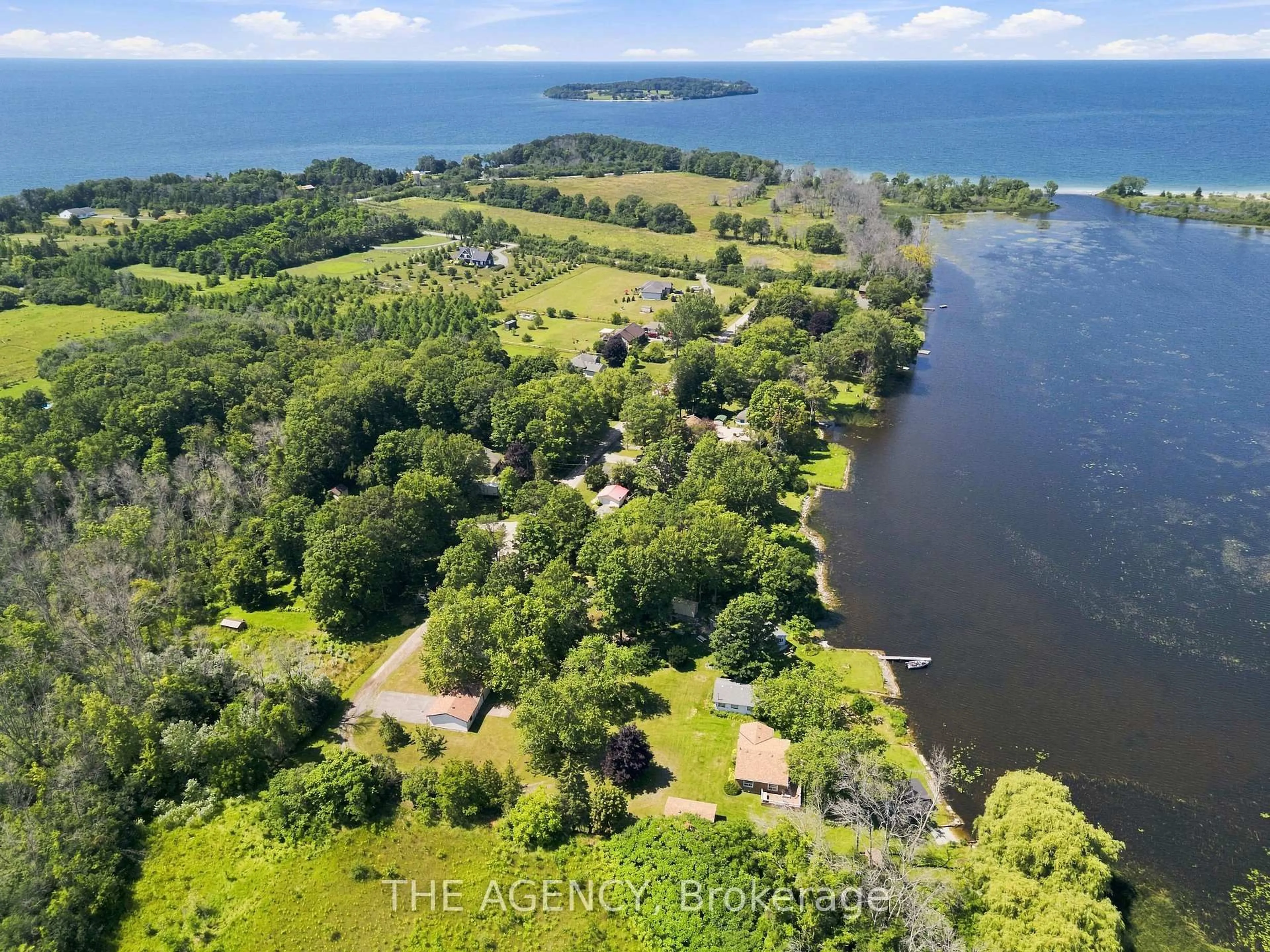 A pic from outside/outdoor area/front of a property/back of a property/a pic from drone, water/lake/river/ocean view for 151 Huycks Bay Rd, Prince Edward County Ontario K0K 2J0