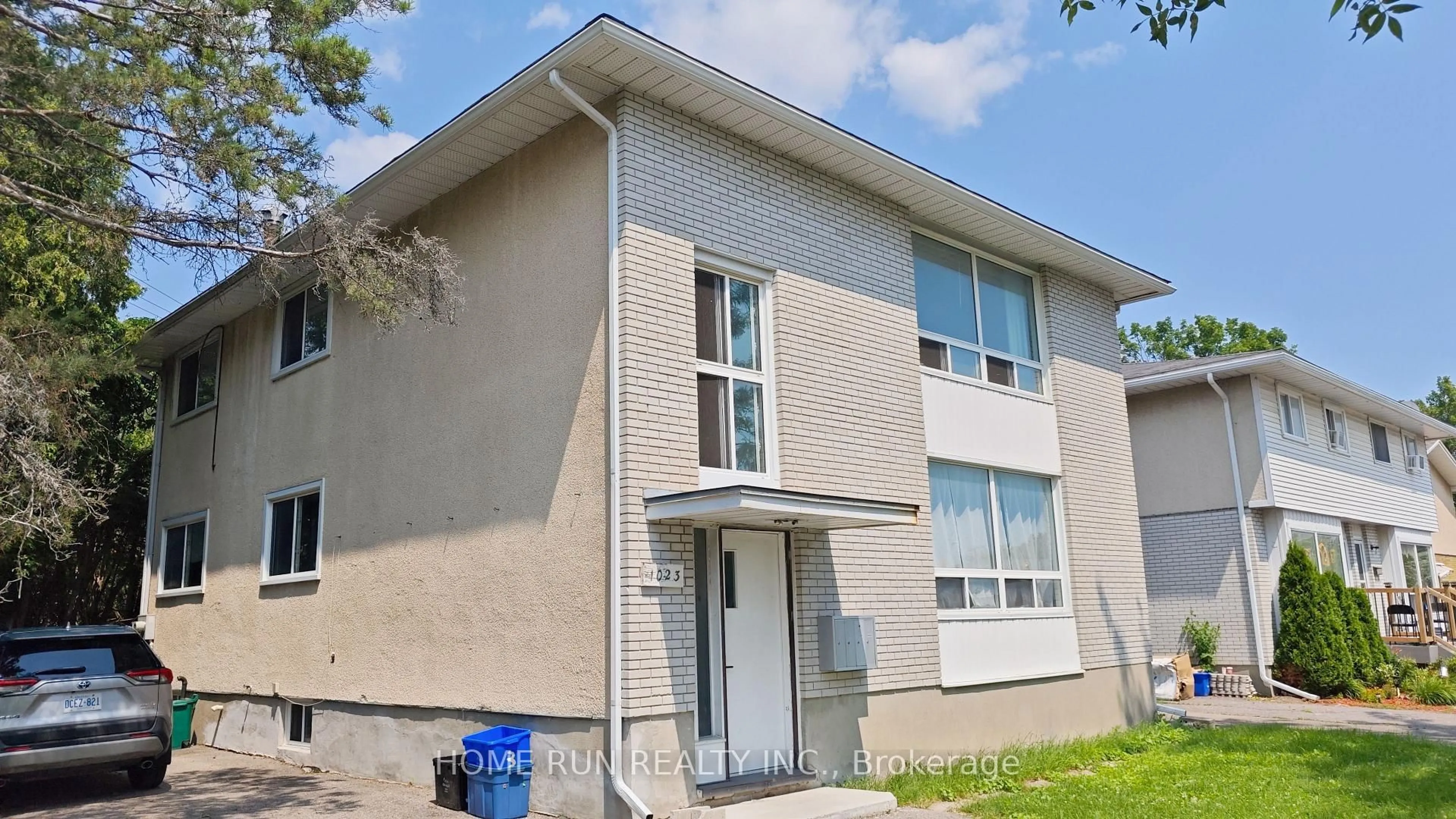 Home with brick exterior material, street for 1023 Meadowlands Dr, Ottawa Ontario K2C 0K5