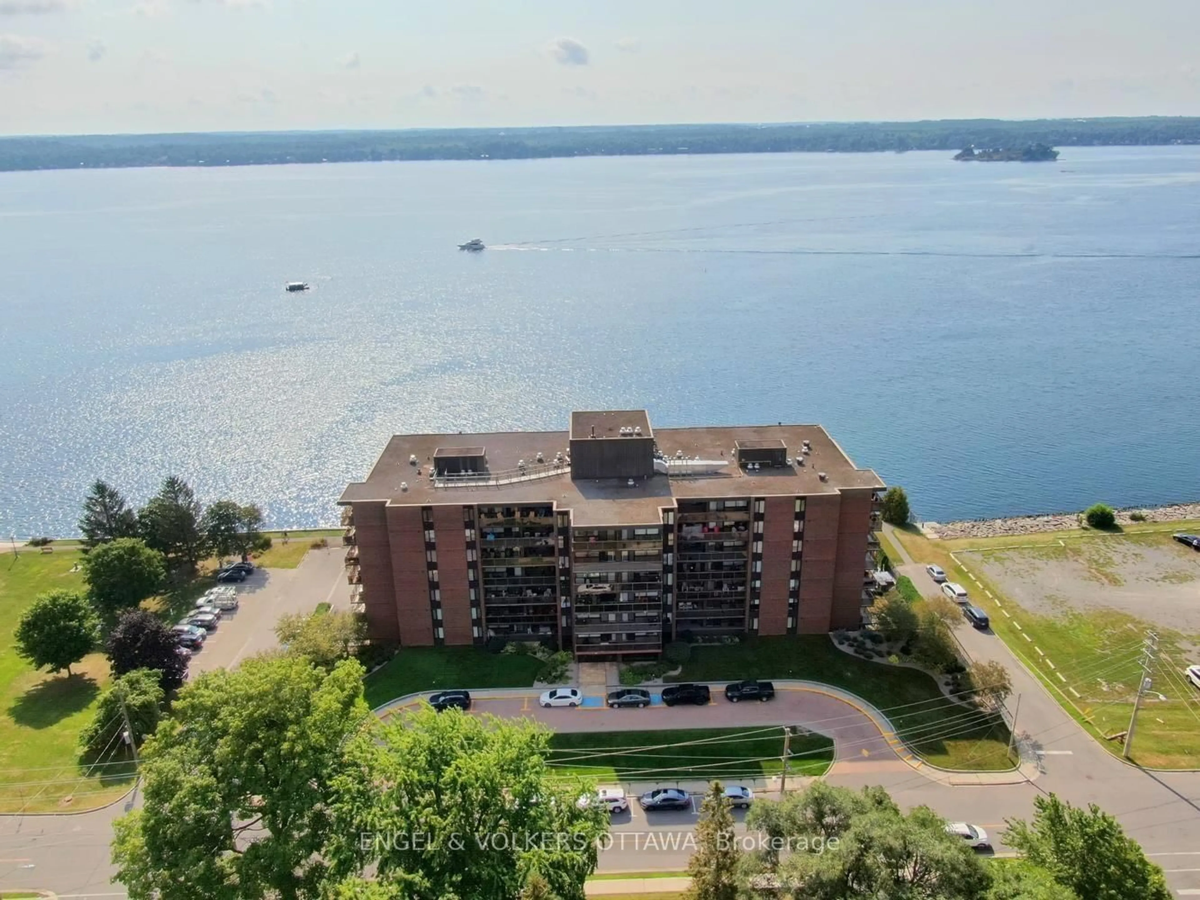 A pic from outside/outdoor area/front of a property/back of a property/a pic from drone, water/lake/river/ocean view for 55 Water St #110, Brockville Ontario K6V 1A3