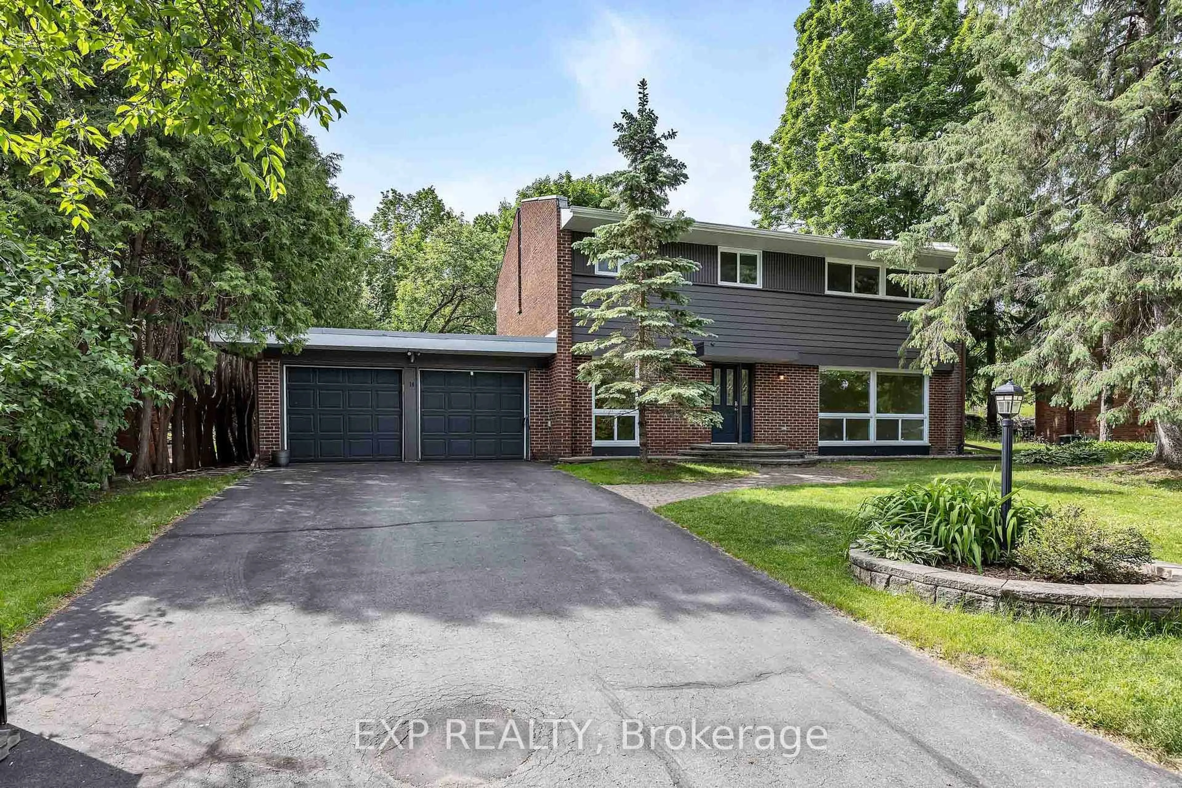 Home with brick exterior material, street for 14 Carr Cres, Kanata Ontario K2K 1K4