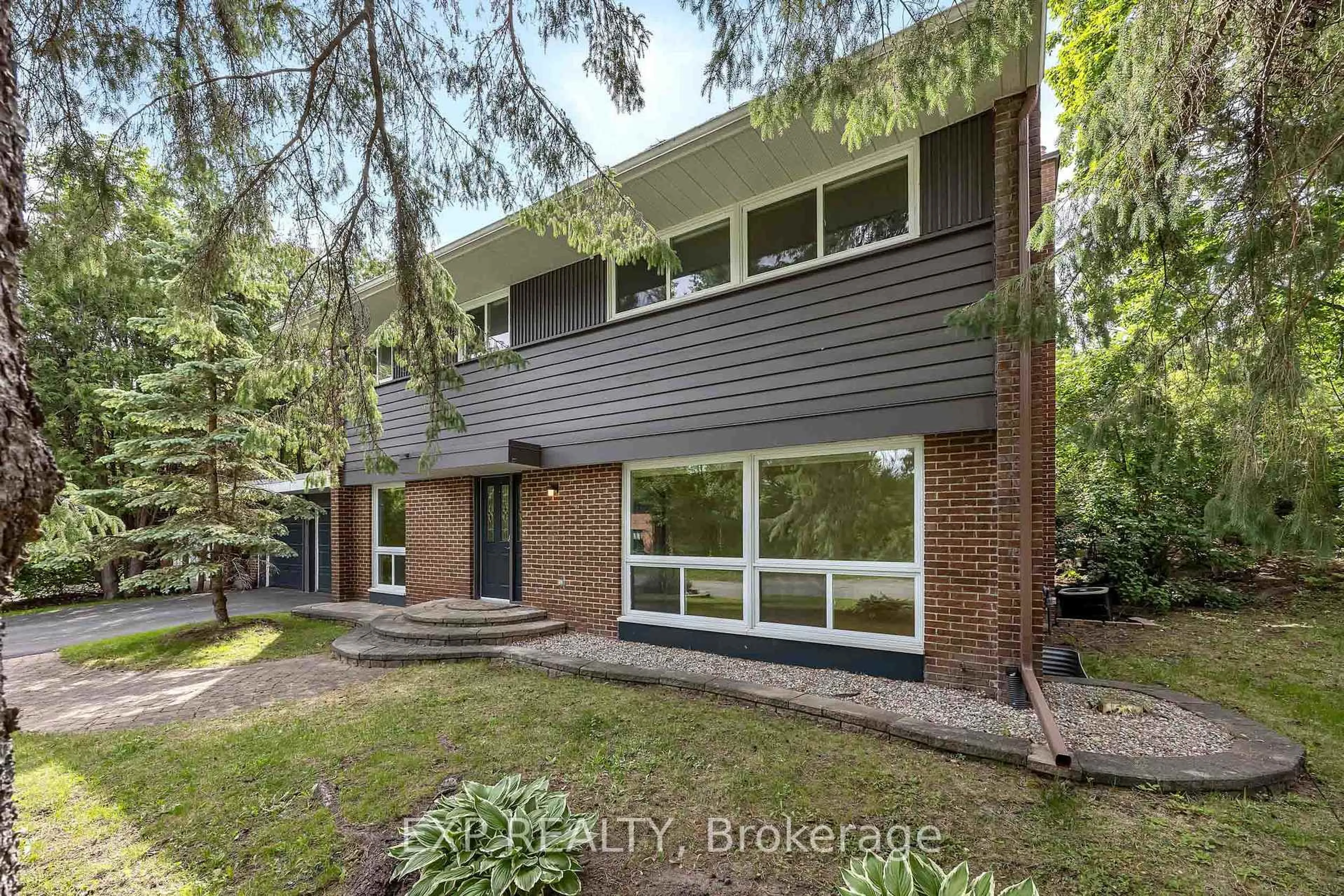 Home with brick exterior material, street for 14 Carr Cres, Kanata Ontario K2K 1K4