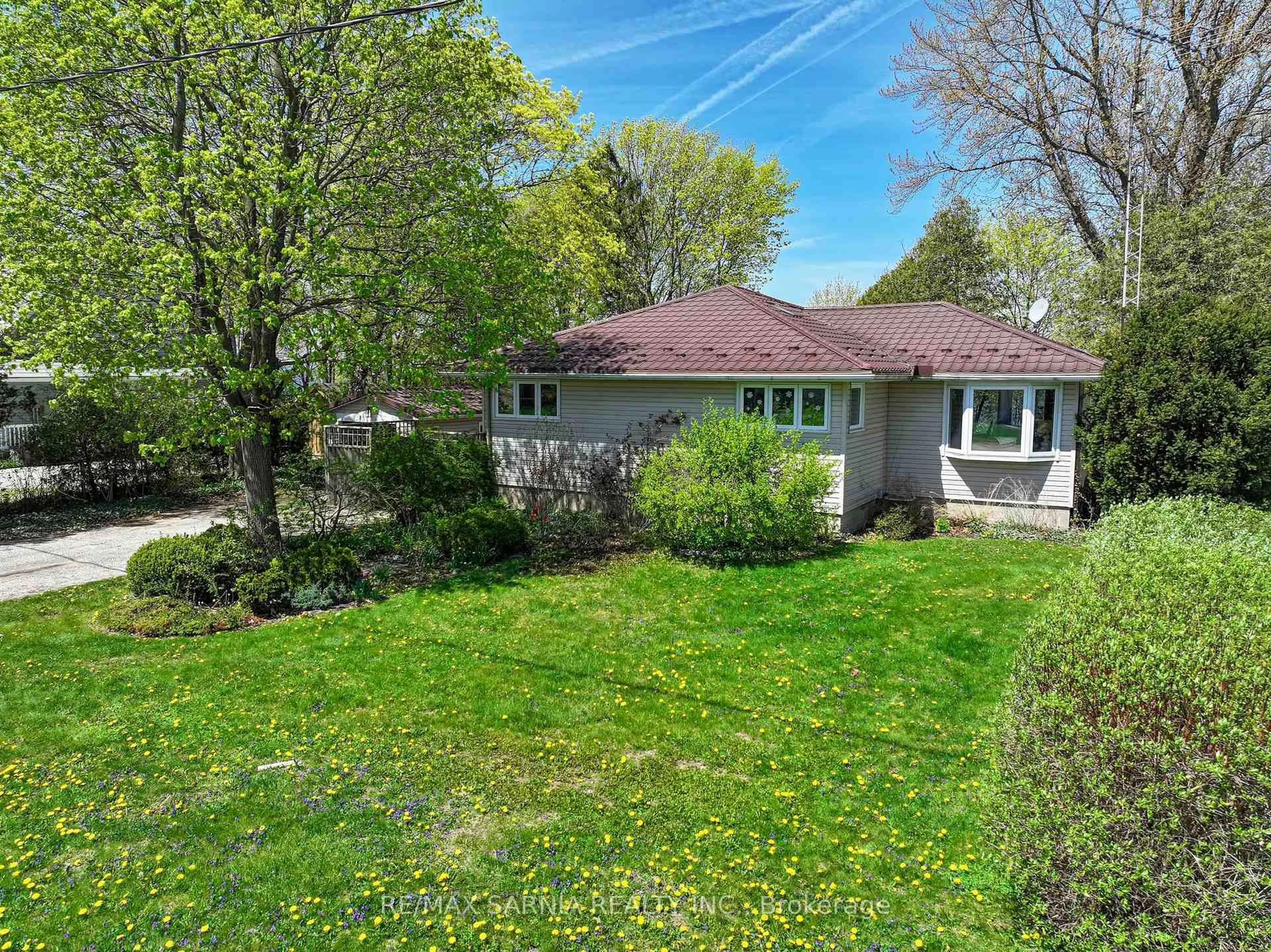 A pic from outside/outdoor area/front of a property/back of a property/a pic from drone, street for 4660 Lakeside St, Plympton-Wyoming Ontario N0N 1J6