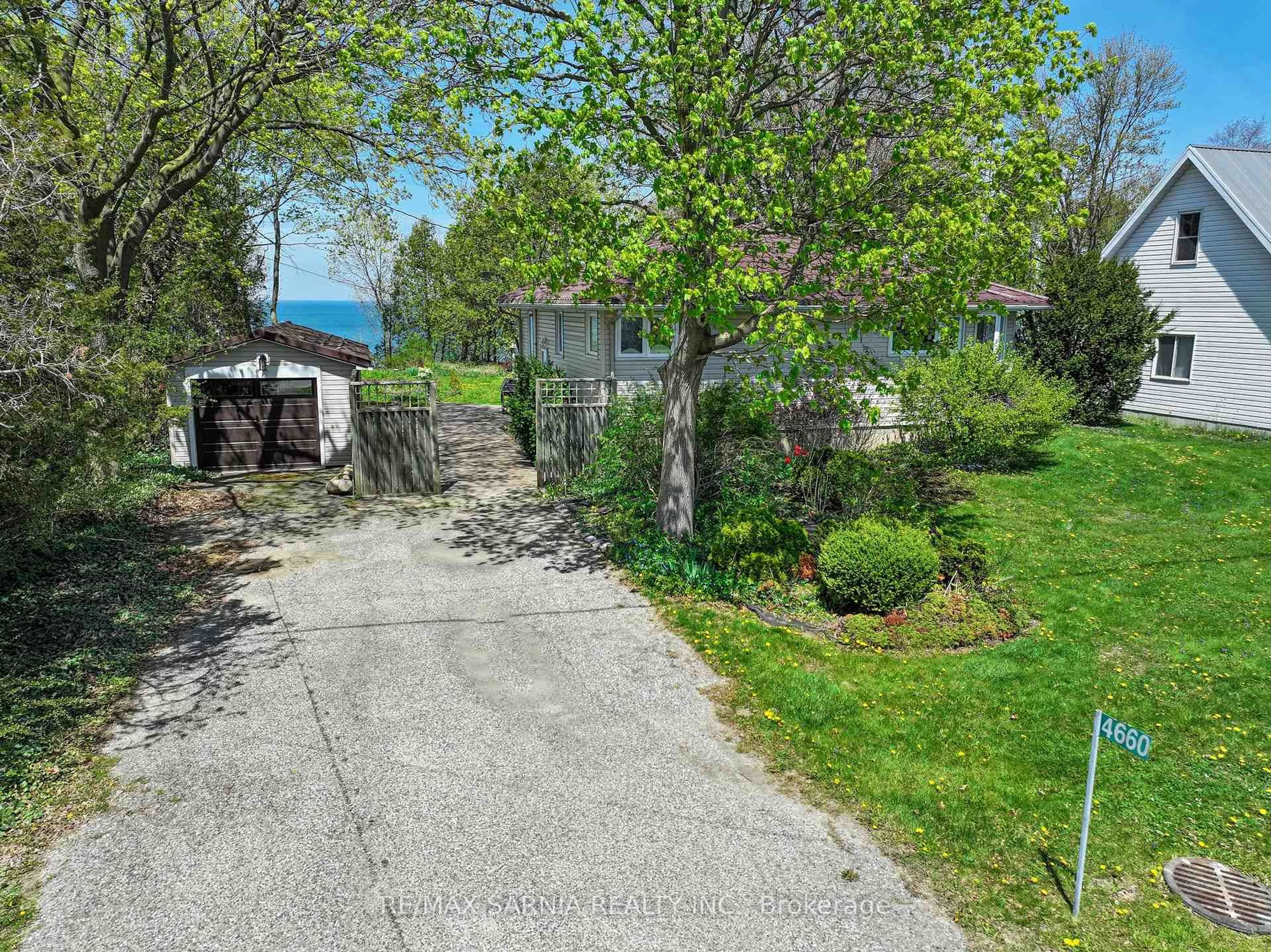 A pic from outside/outdoor area/front of a property/back of a property/a pic from drone, street for 4660 Lakeside St, Plympton-Wyoming Ontario N0N 1J6