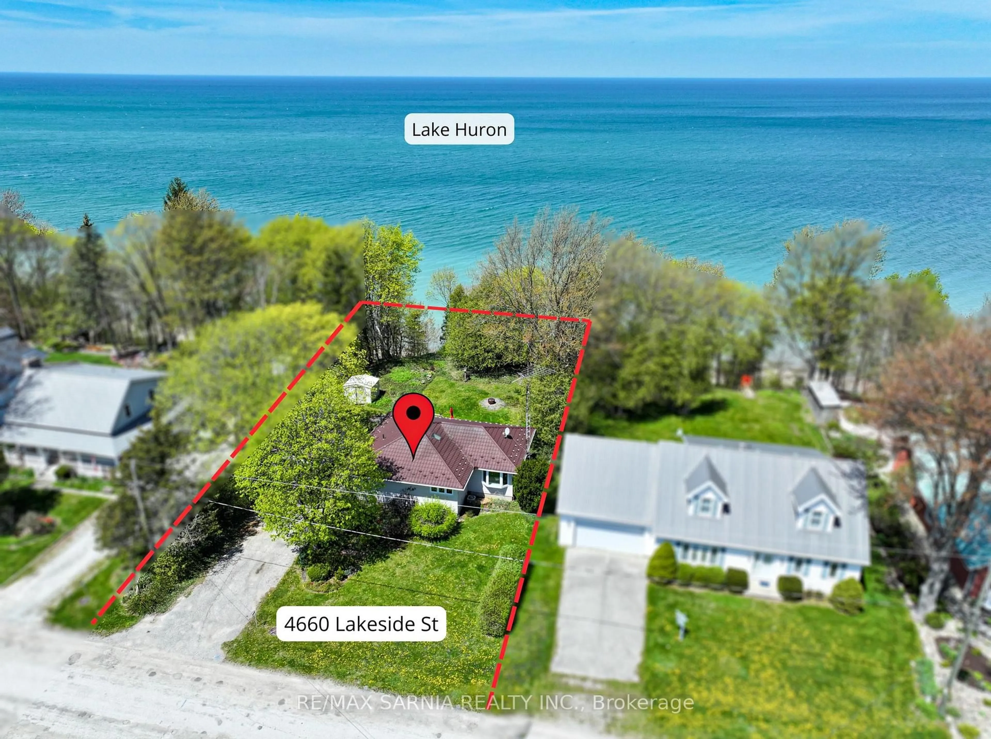 A pic from outside/outdoor area/front of a property/back of a property/a pic from drone, water/lake/river/ocean view for 4660 Lakeside St, Plympton-Wyoming Ontario N0N 1J6