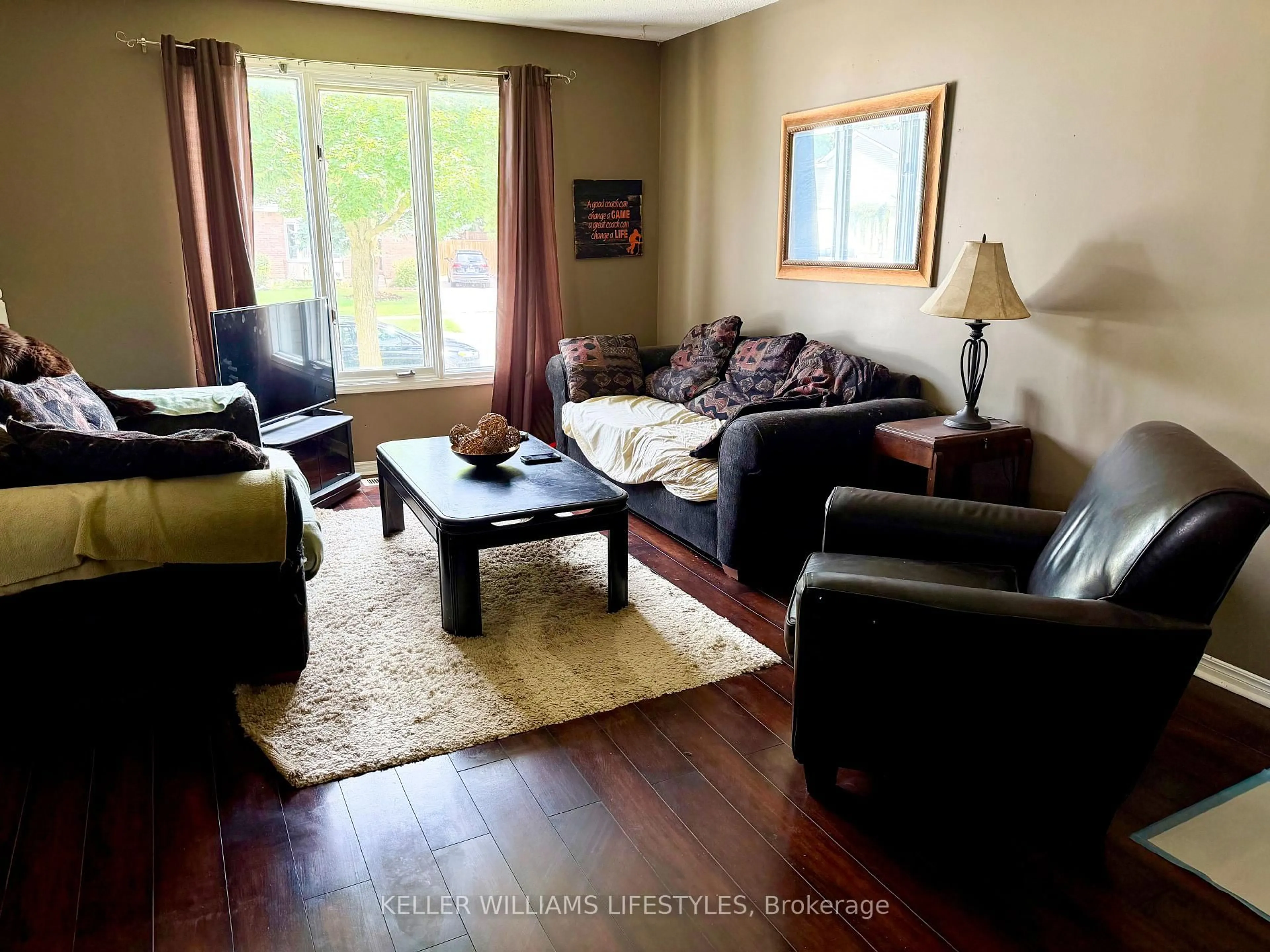 Living room with furniture, wood/laminate floor for 95 Bonaventure Dr, London East Ontario N5V 4A7