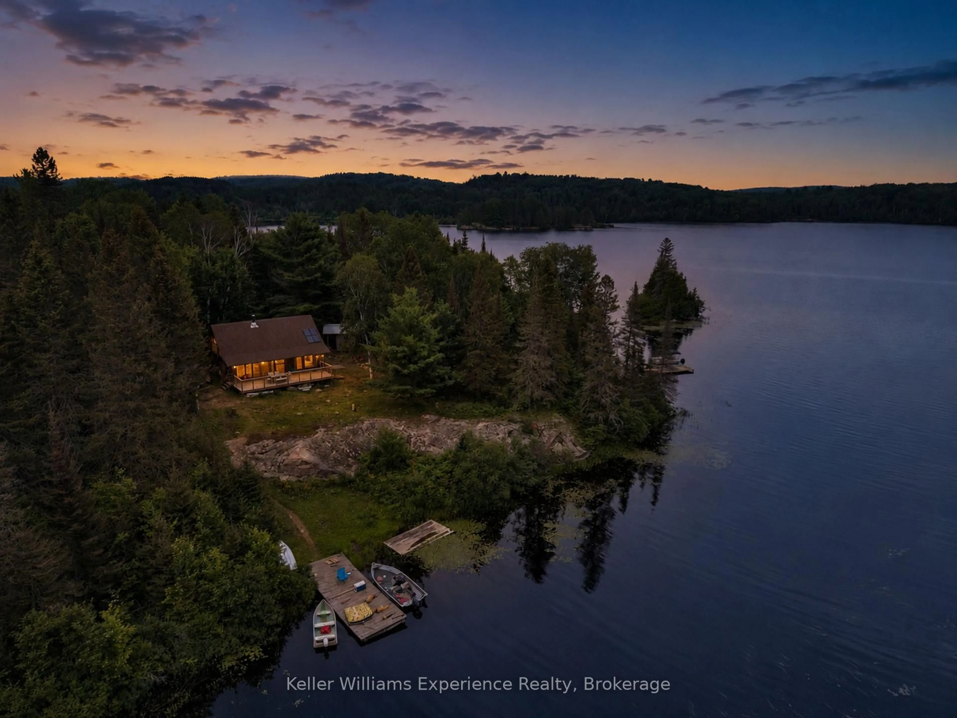 A pic from outside/outdoor area/front of a property/back of a property/a pic from drone, water/lake/river/ocean view for 9000 Galeairy Lake, South Algonquin Ontario K0J 2M0
