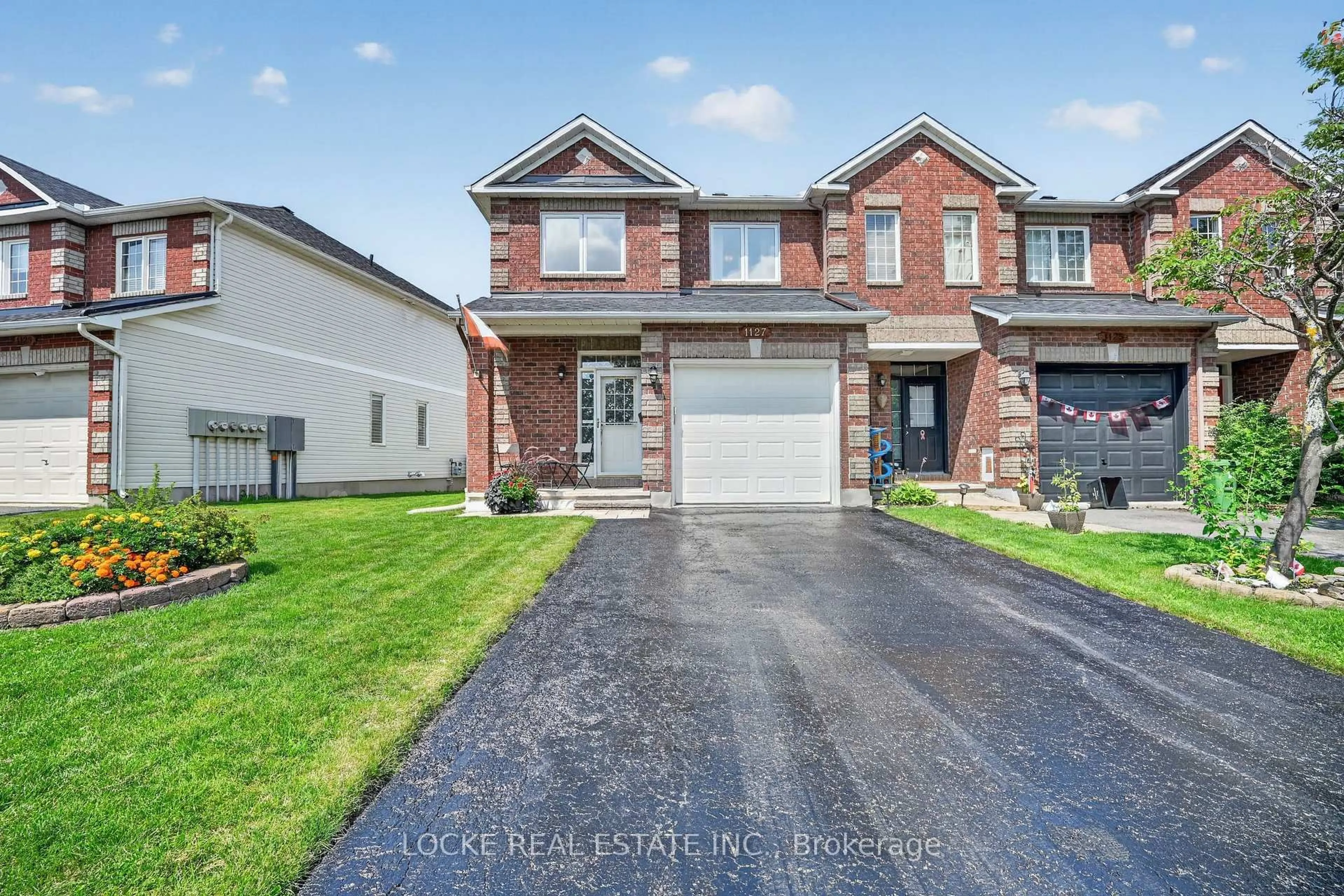 Home with brick exterior material, street for 1127 Brasseur Cres, Orleans Ontario K4A 5A2