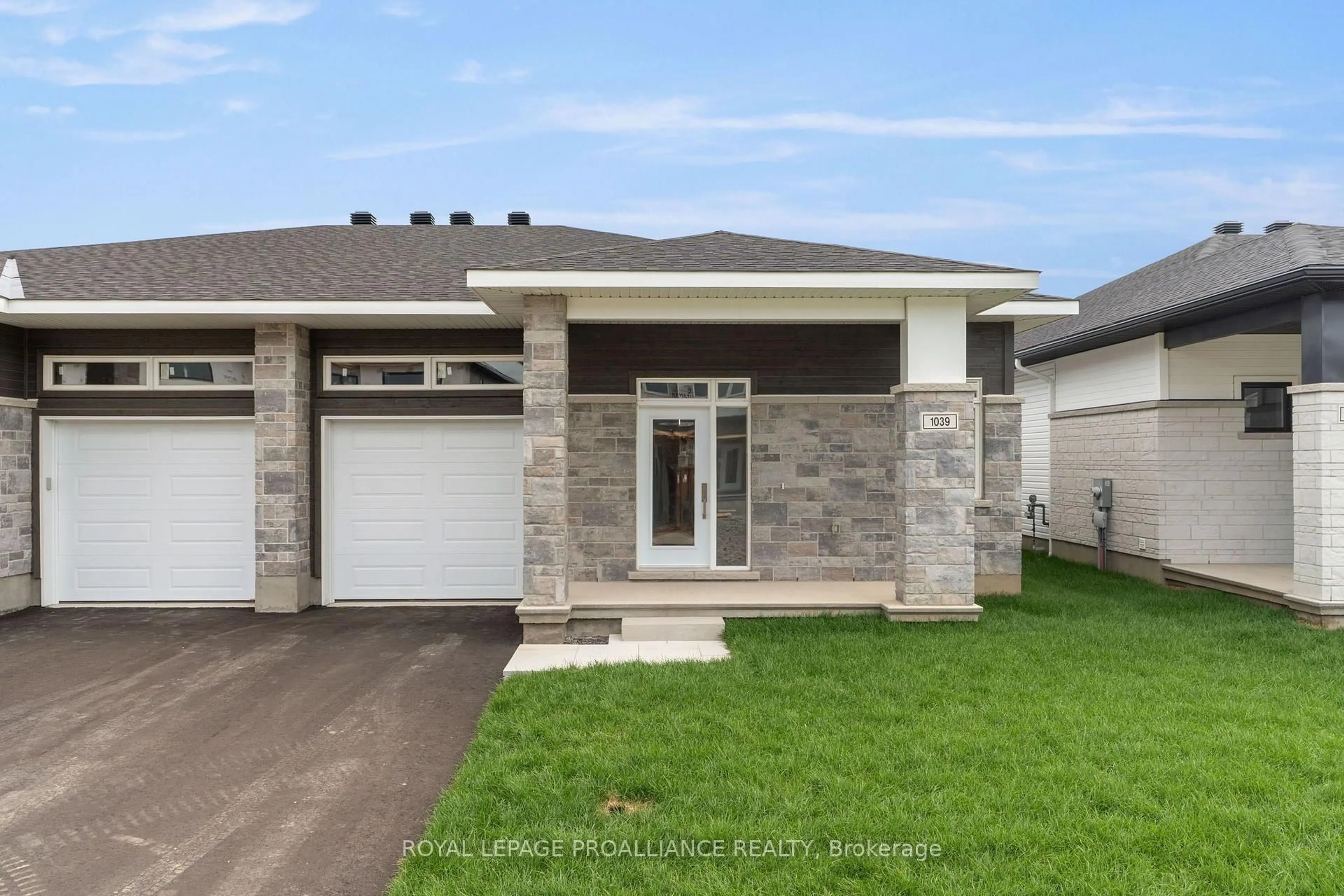 Home with brick exterior material, street for 1039 Moore St, Brockville Ontario K6V 0H1