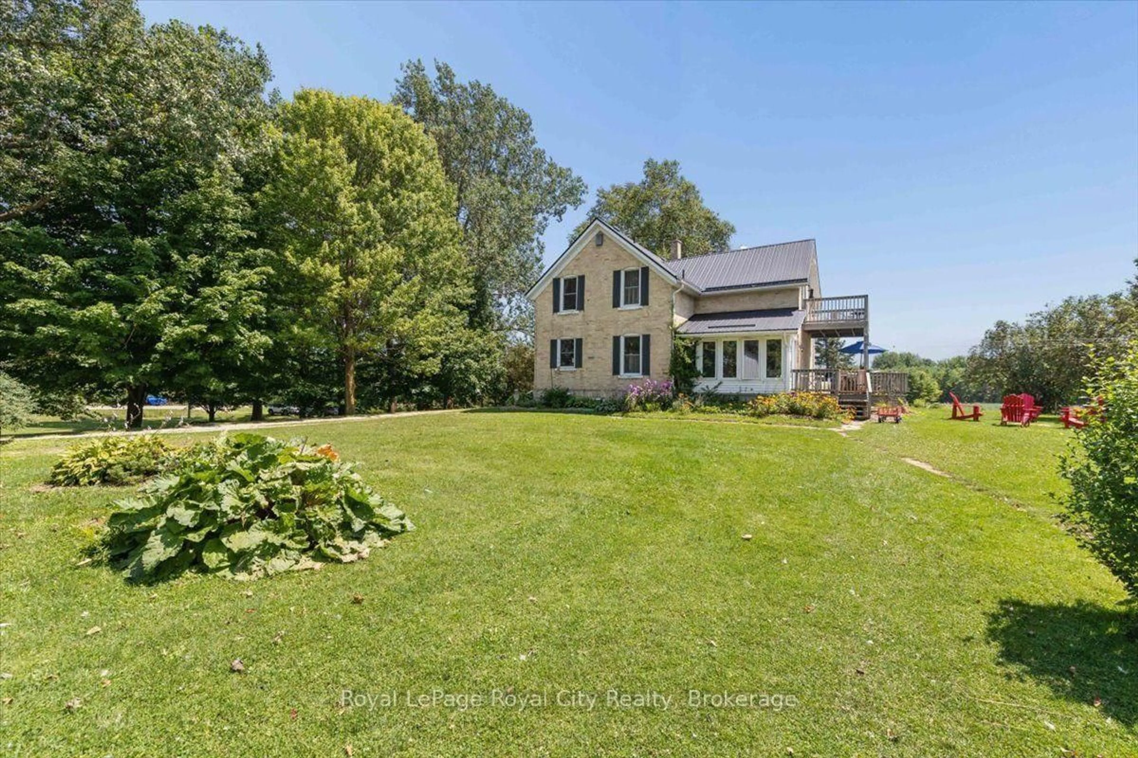 A pic from outside/outdoor area/front of a property/back of a property/a pic from drone, water/lake/river/ocean view for 5453 9 Highway, Minto Ontario N0G 1M0