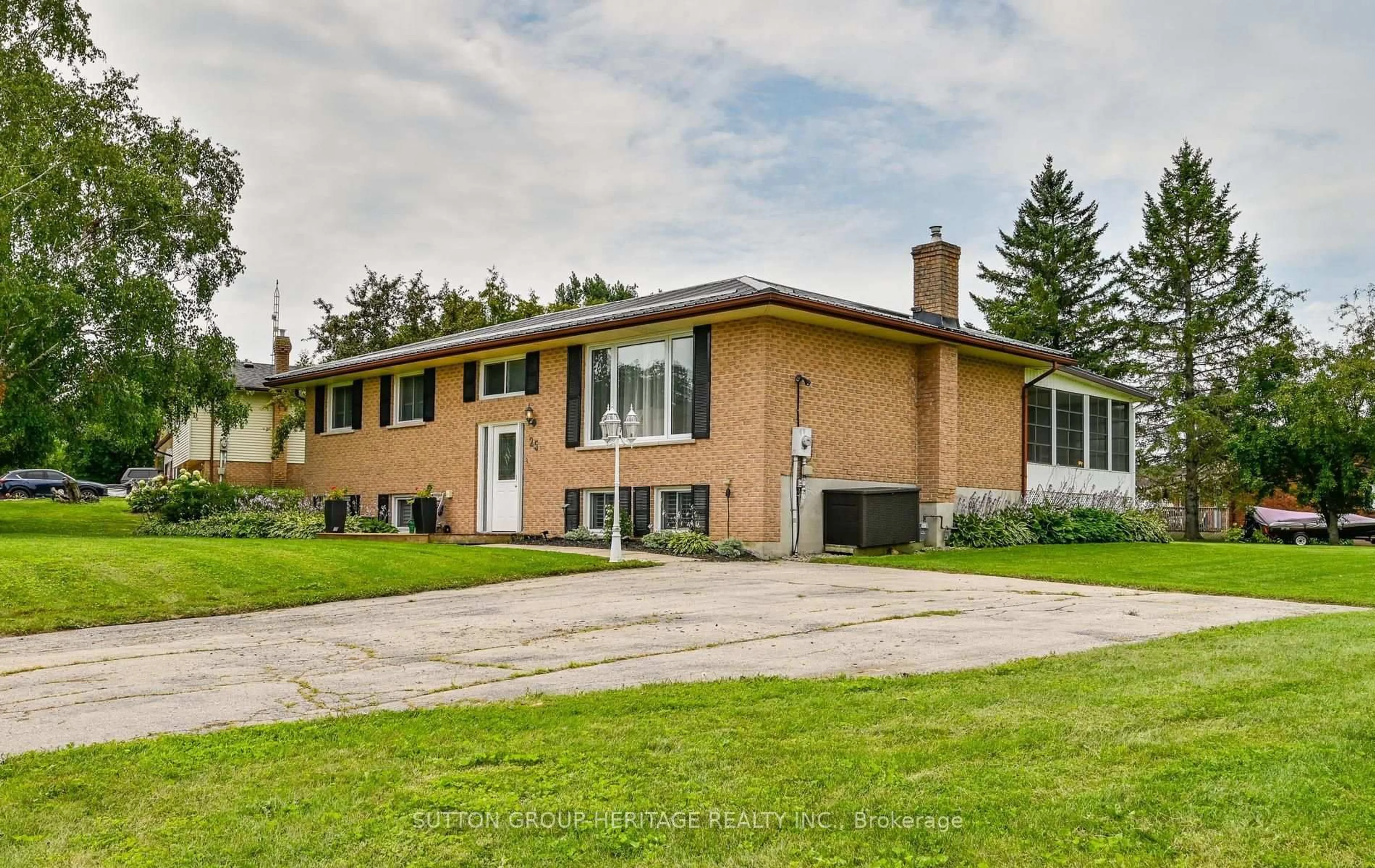 Home with brick exterior material, street for 25 Manvers Dr, Kawartha Lakes Ontario L0B 1K0