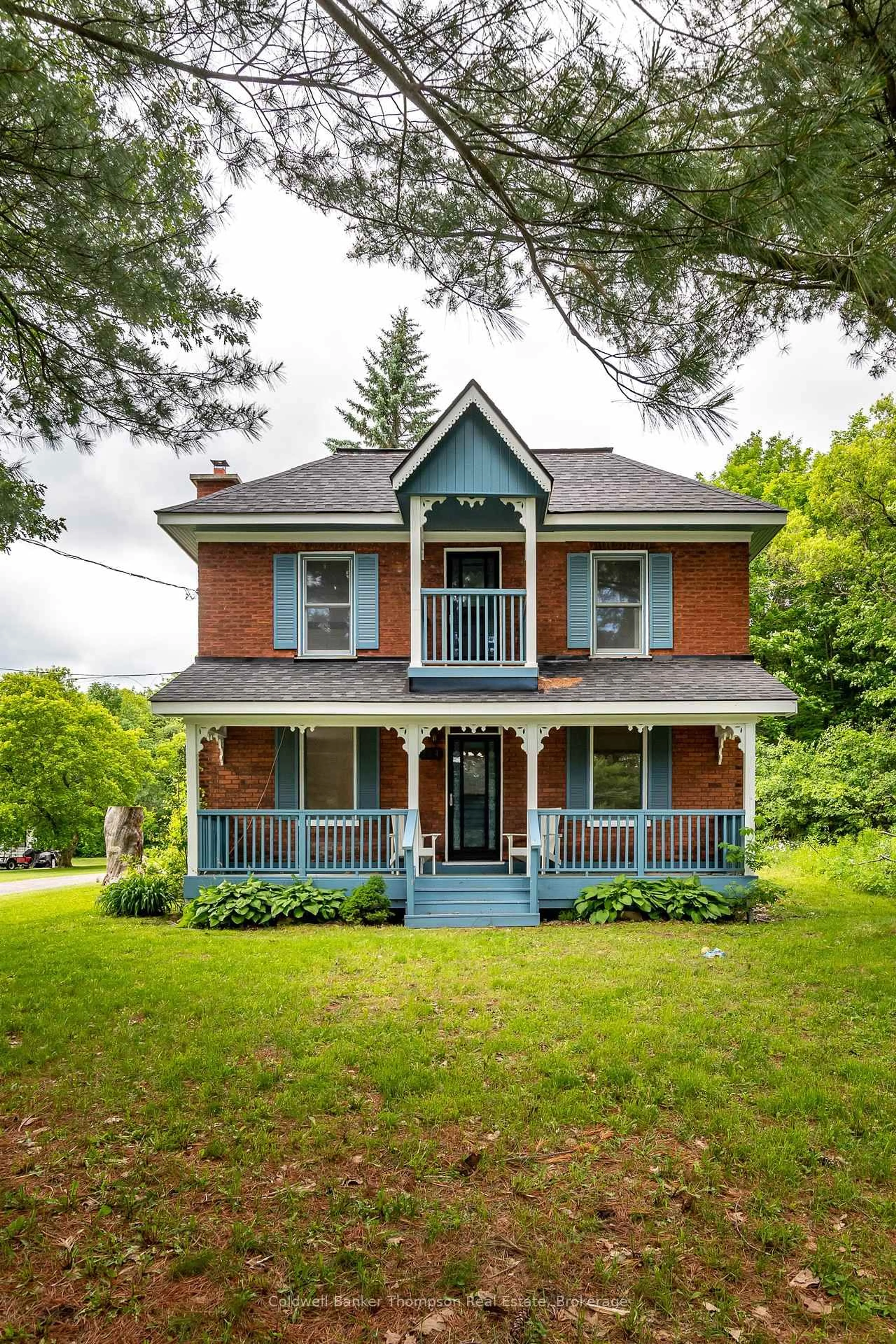 Home with brick exterior material, street for 124 Hunters Bay Dr, Huntsville Ontario P1H 1M9